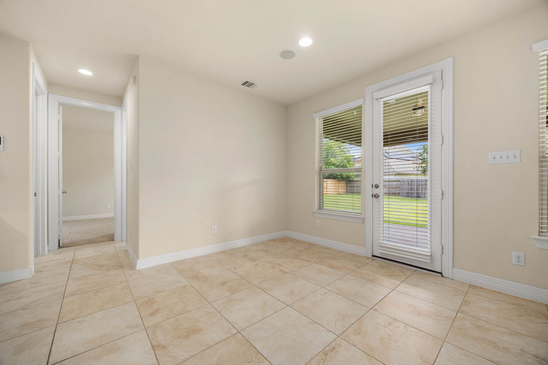 26306 Sunny Springs Lane, Cypress, TX 77433 Bright breakfast area or casual dining space makes morning routines a breeze.