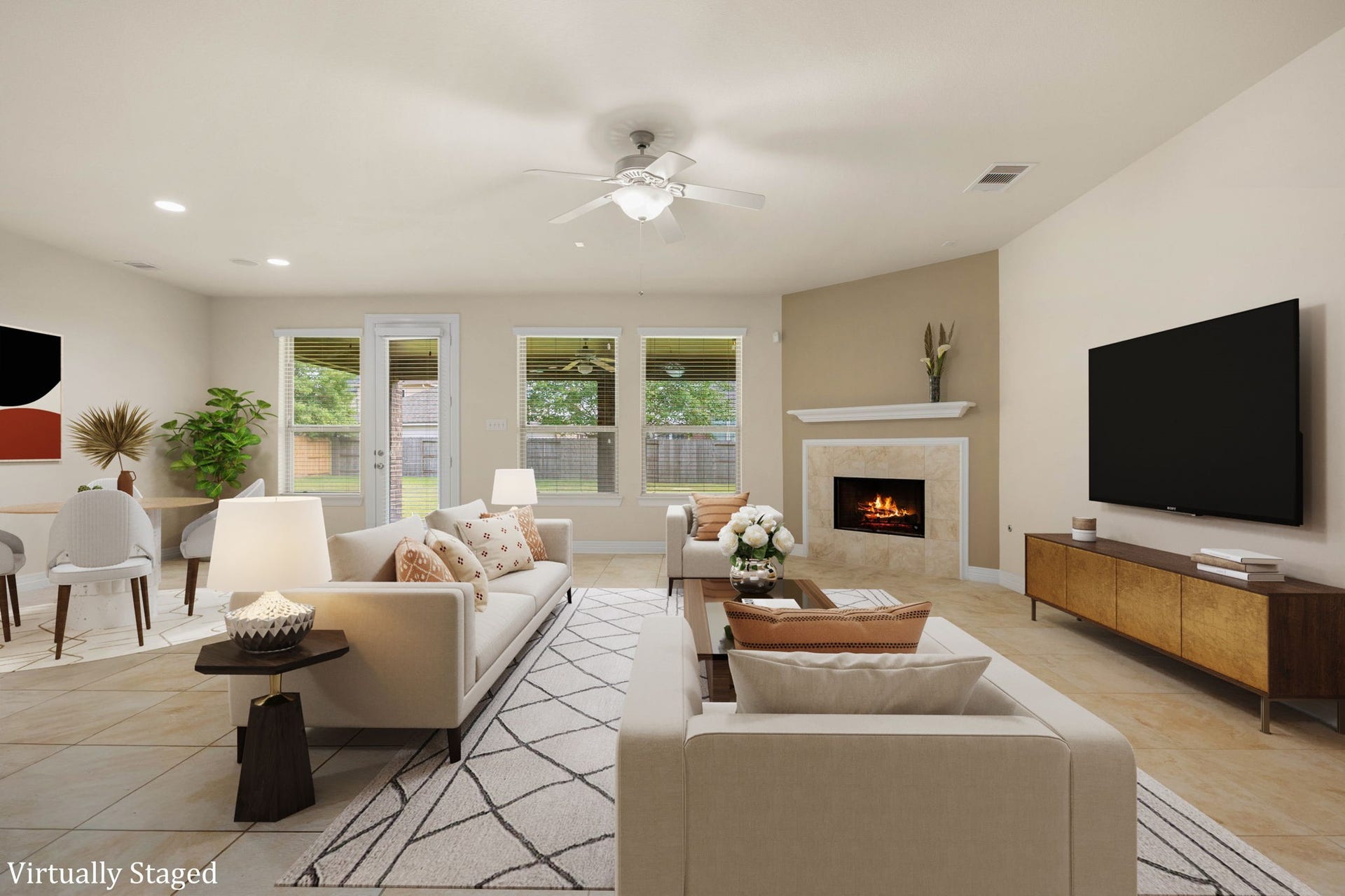 26306 Sunny Springs Lane, Cypress, TX 77433 A family room where everyone can be together cooking, socializing, or celebrating around the fire! (Virtually staged to showcase possibilities)