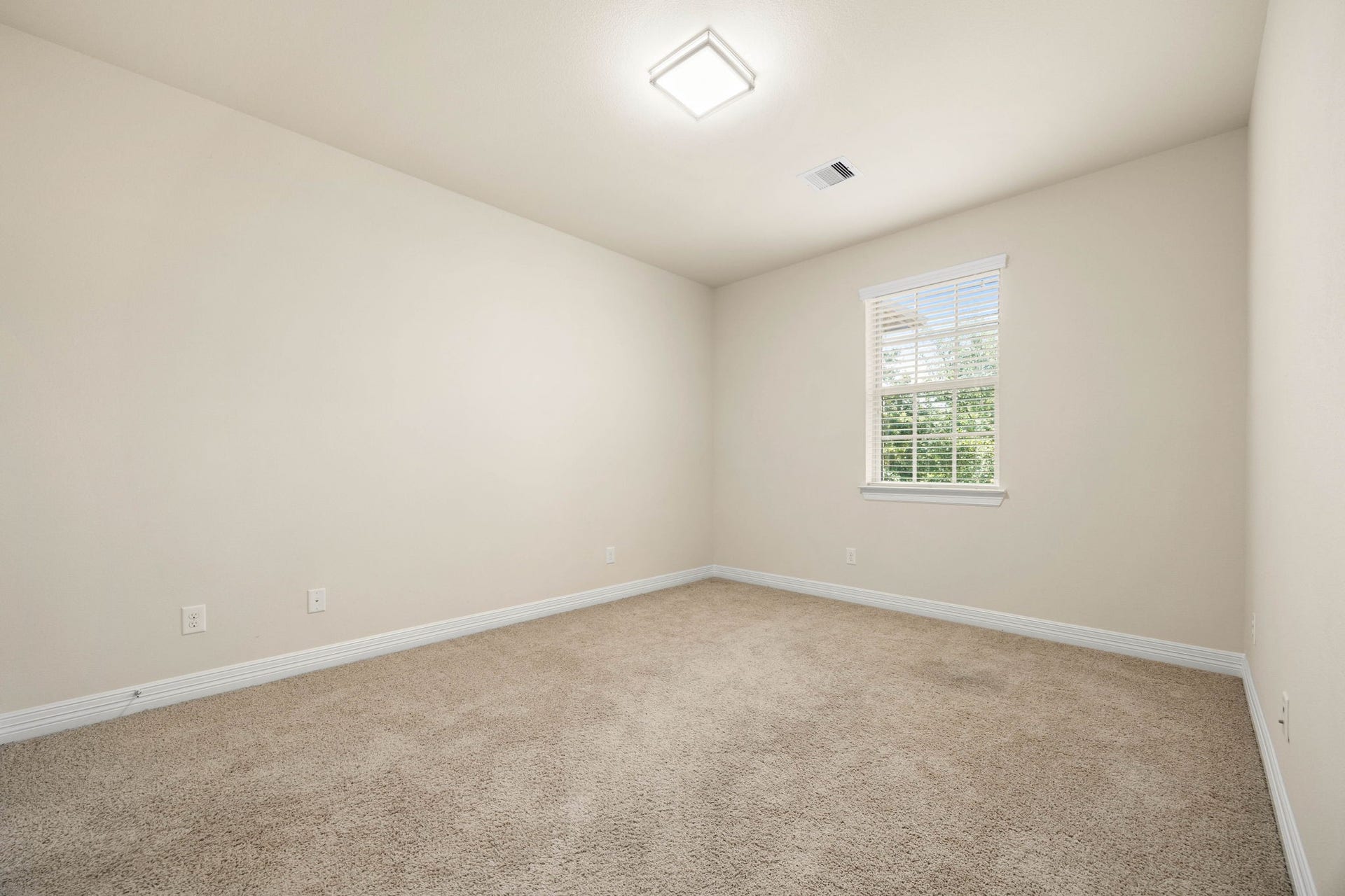 26306 Sunny Springs Lane, Cypress, TX 77433 The third upstairs secondary bedroom...all three of which are off a hallway with a niche perfect for setting up a study spot, book nook, or relaxing space.