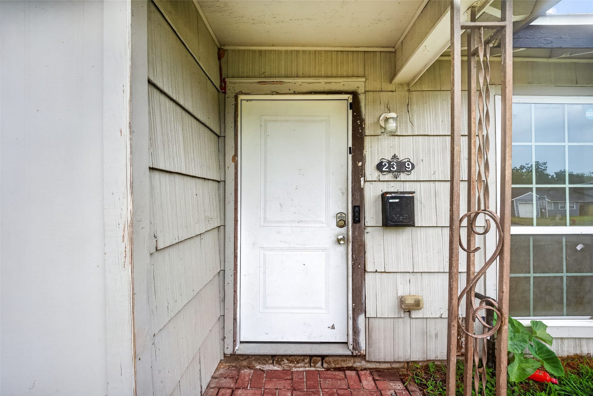 The covered entry leads you into the home.