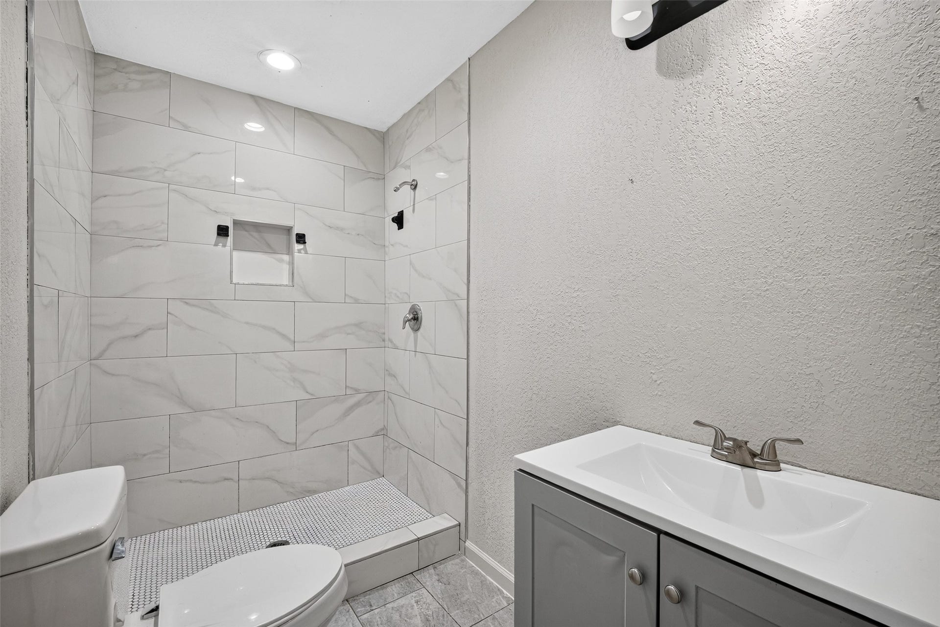 Primary bath with shower only.