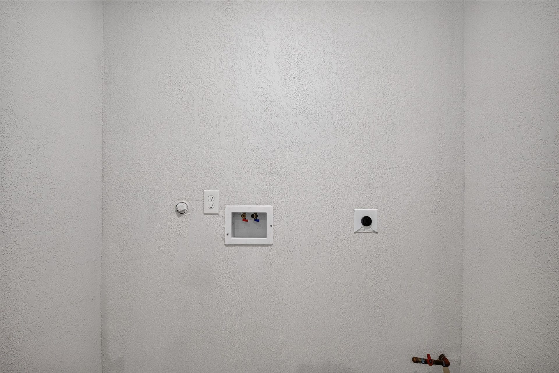 Utility room located off the kitchen.