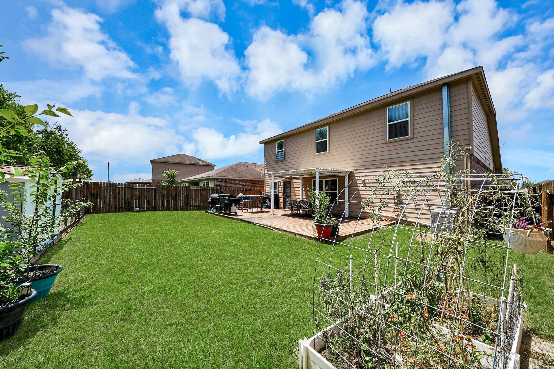 415 Hawks View Drive, La Marque, TX 77568 View from corner of the home. Spacious yard
