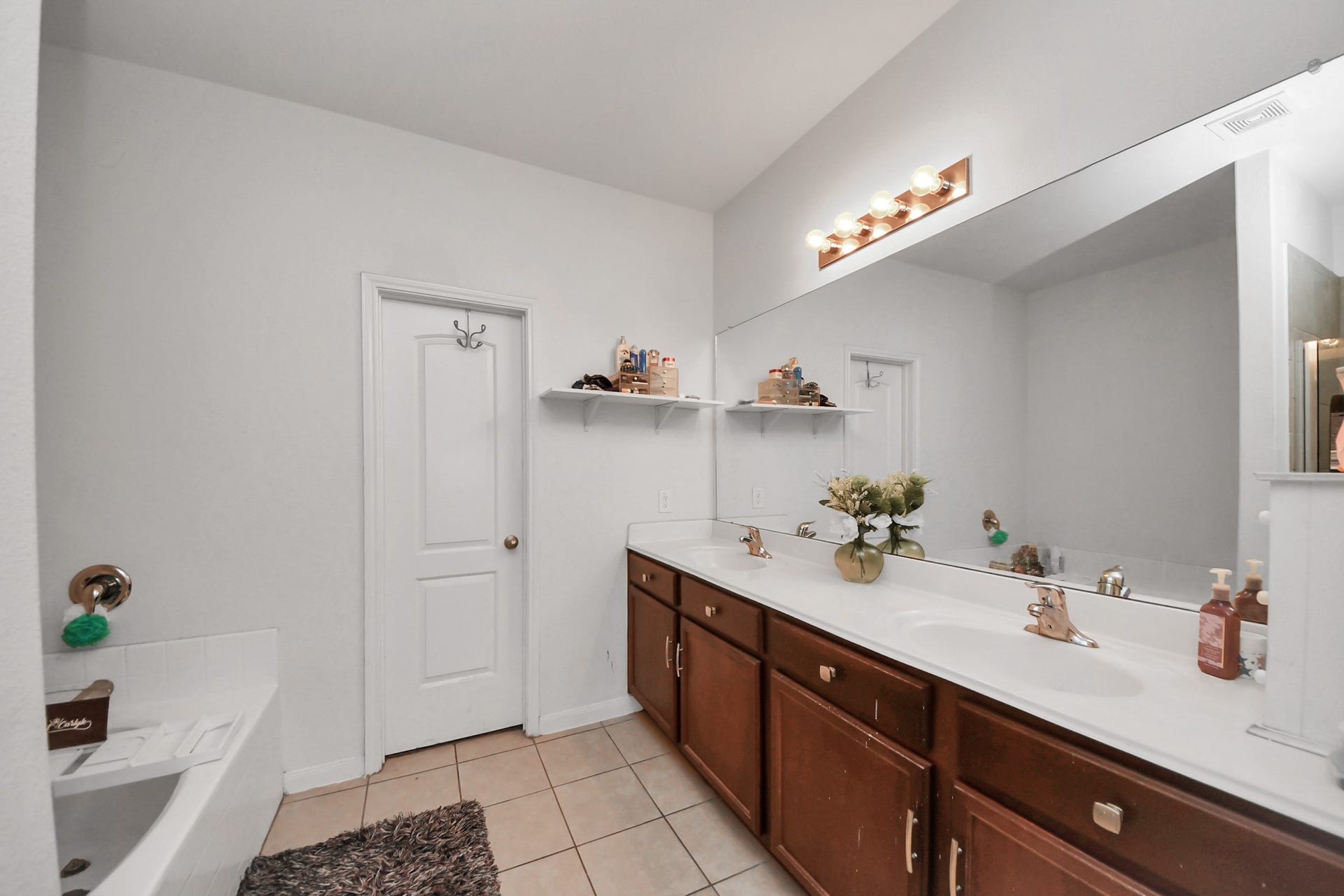 415 Hawks View Drive, La Marque, TX 77568 Double Vanity in primary suite restroom.