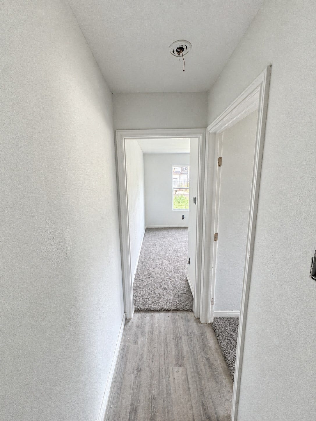 423 N Carolina Street, Houston, TX 77029 Hallway connecting the homes main living areas.