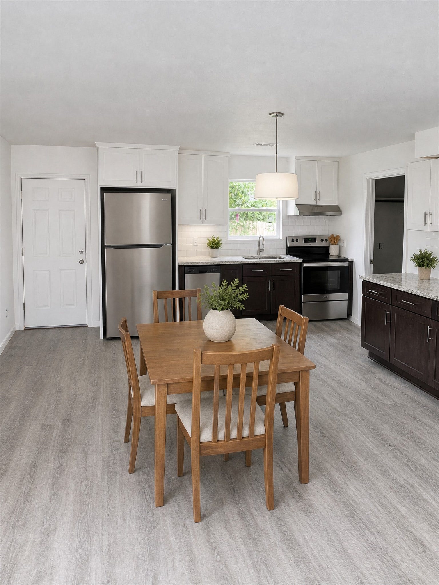 423 N Carolina Street, Houston, TX 77029 A complete kitchen concept adds storage, appliances, and dining space.