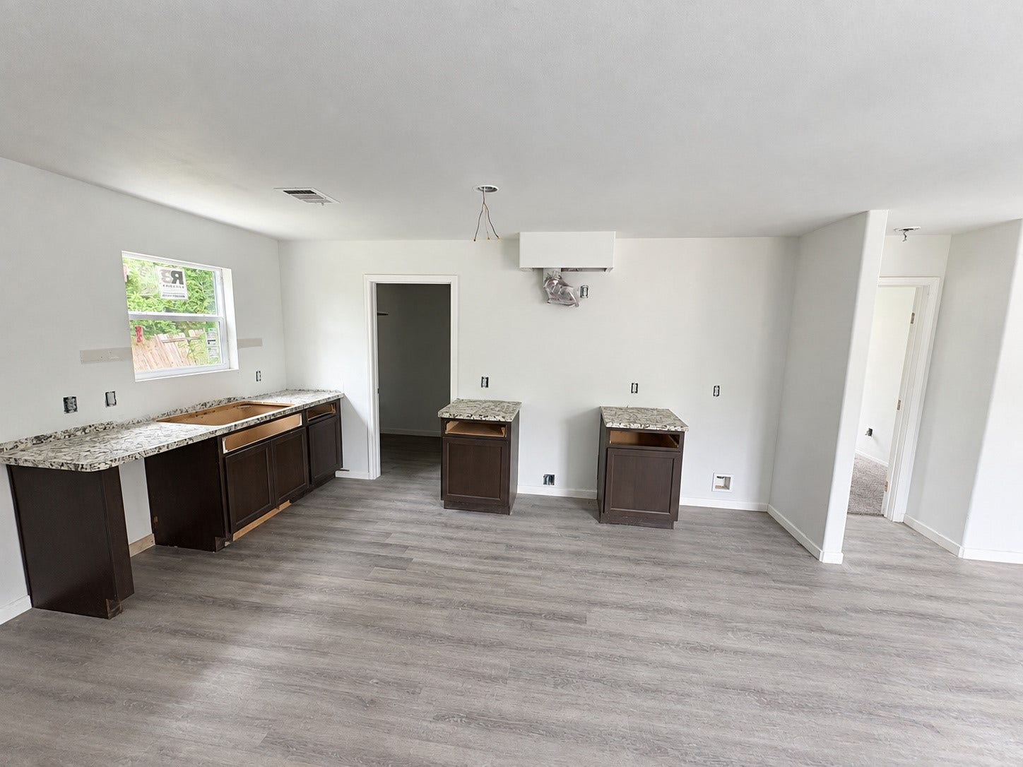 423 N Carolina Street, Houston, TX 77029 Kitchen and dining view with an efficient workspace.