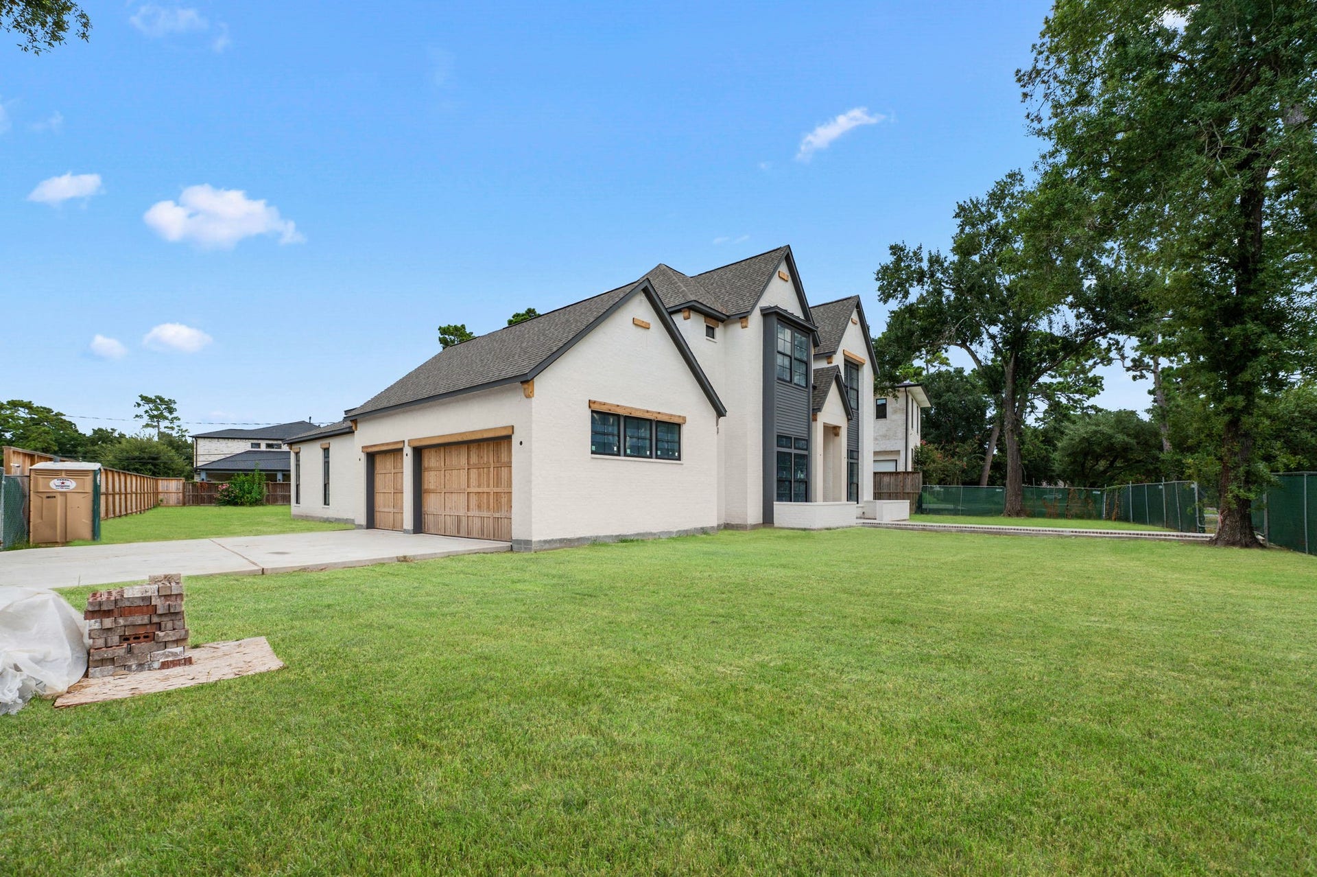 752 W 43rd Street, Houston, TX 77018 Home offers a 3-car garage on side of the home. Front entry will have a grand bricked entrance w/ designer landscaping. *Construction Progress Photo taken 7/30/26