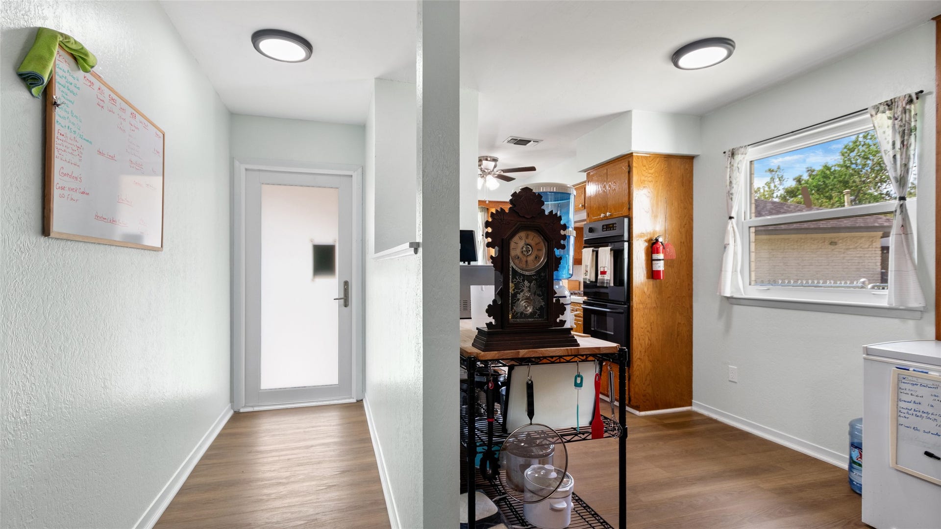 503 Allen Court, Alvin, TX 77511 Flexible space just off the kitchen offers abundant natural light, wood-look flooring, and potential for a breakfast area, home office, or additional everyday living space.