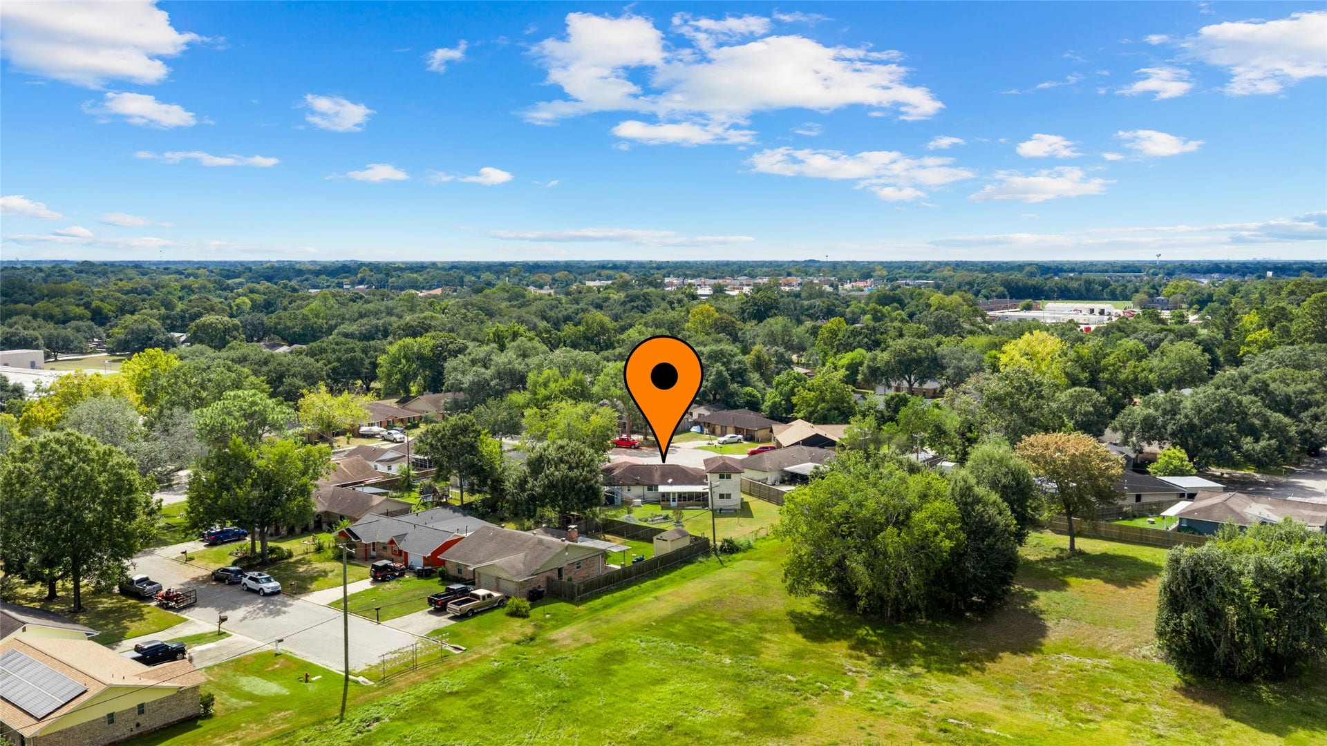 503 Allen Court, Alvin, TX 77511 Aerial view highlights the homes location within an established residential neighborhood, surrounded by mature trees and nearby green space.