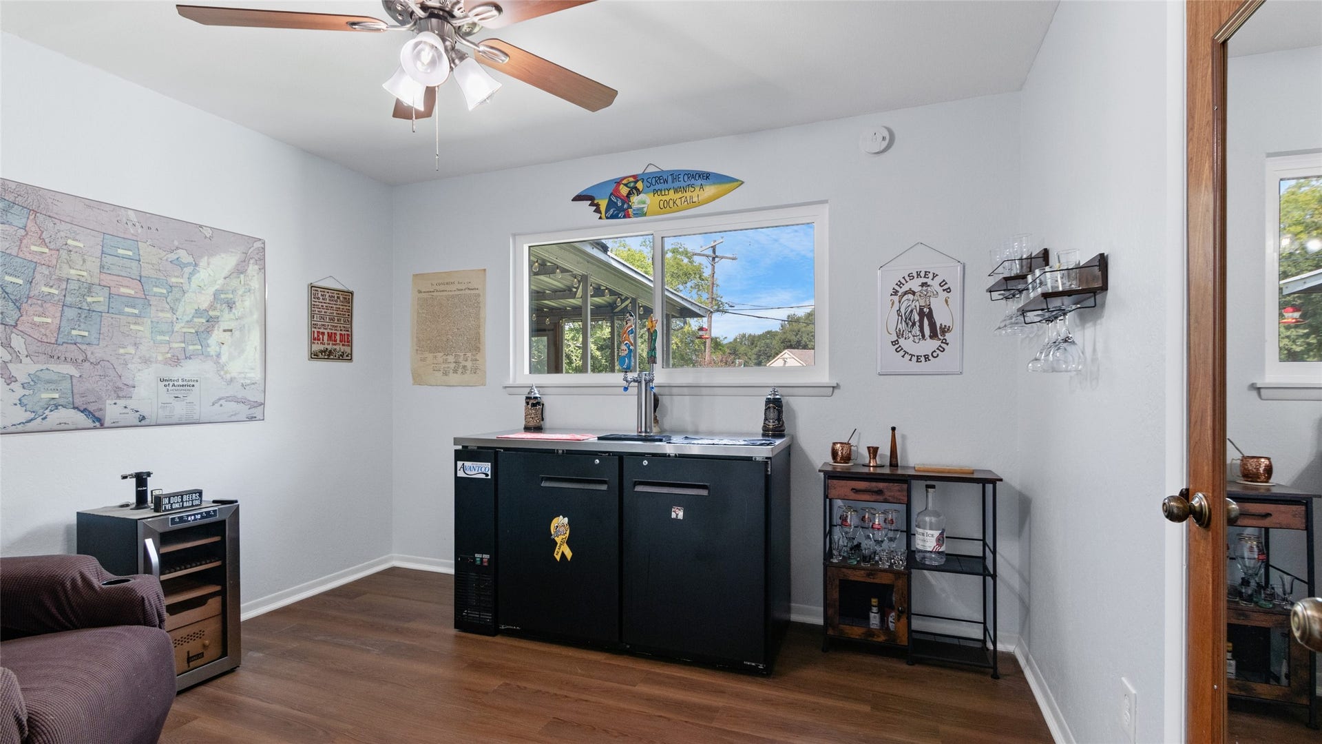 503 Allen Court, Alvin, TX 77511 Versatile bonus room offers plenty of space for a home office, game room, hobby space, or additional living area, with a large window providing natural light.
