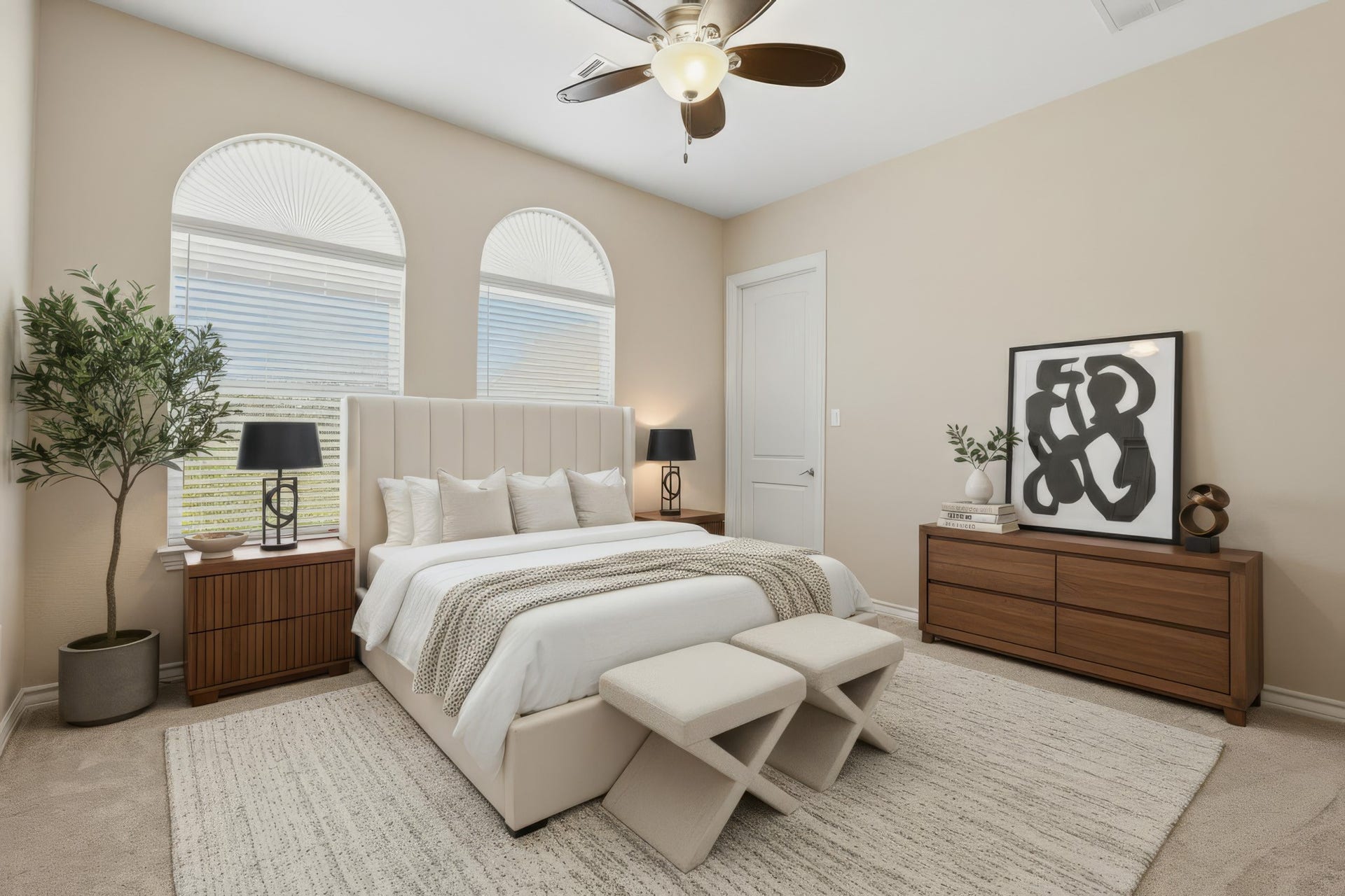 Spacious secondary bedroom on the 2nd floor (virtually staged) offers both comfort and privacy with the added luxury of a private en suite bath and walk-in closet. Elegant arched windows fill the room with natural light, creating a bright and inviting atmosphere while enhancing its architectural charm.