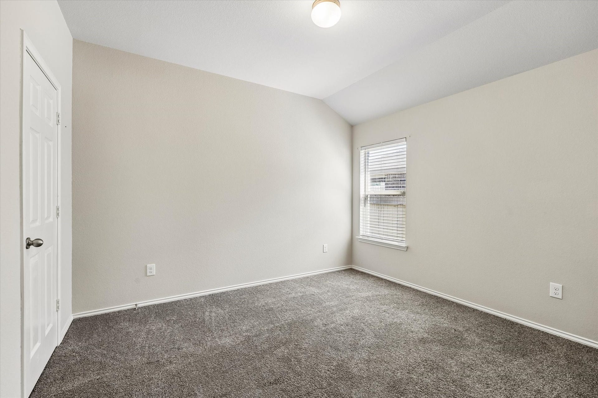 111 Valiant Ridge Trail, Magnolia, TX 77354 Another secondary bedroom provides comfortable carpeted flooring, natural light and closet storage.