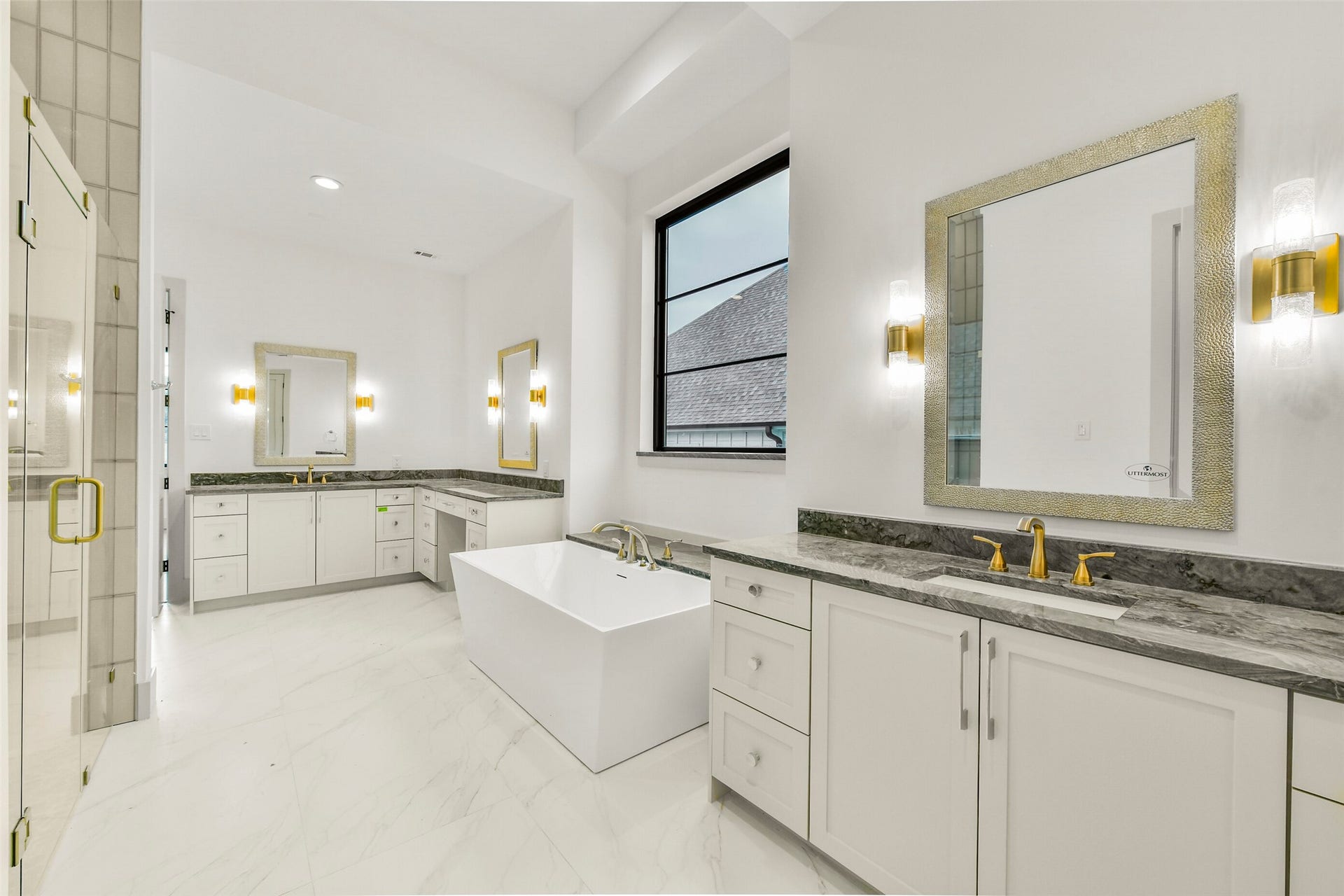 Have a spa day everyday in your lavishly appointed primary bath! Features include: double sinks, sit down vanity, vessel tub and large walk-in shower.