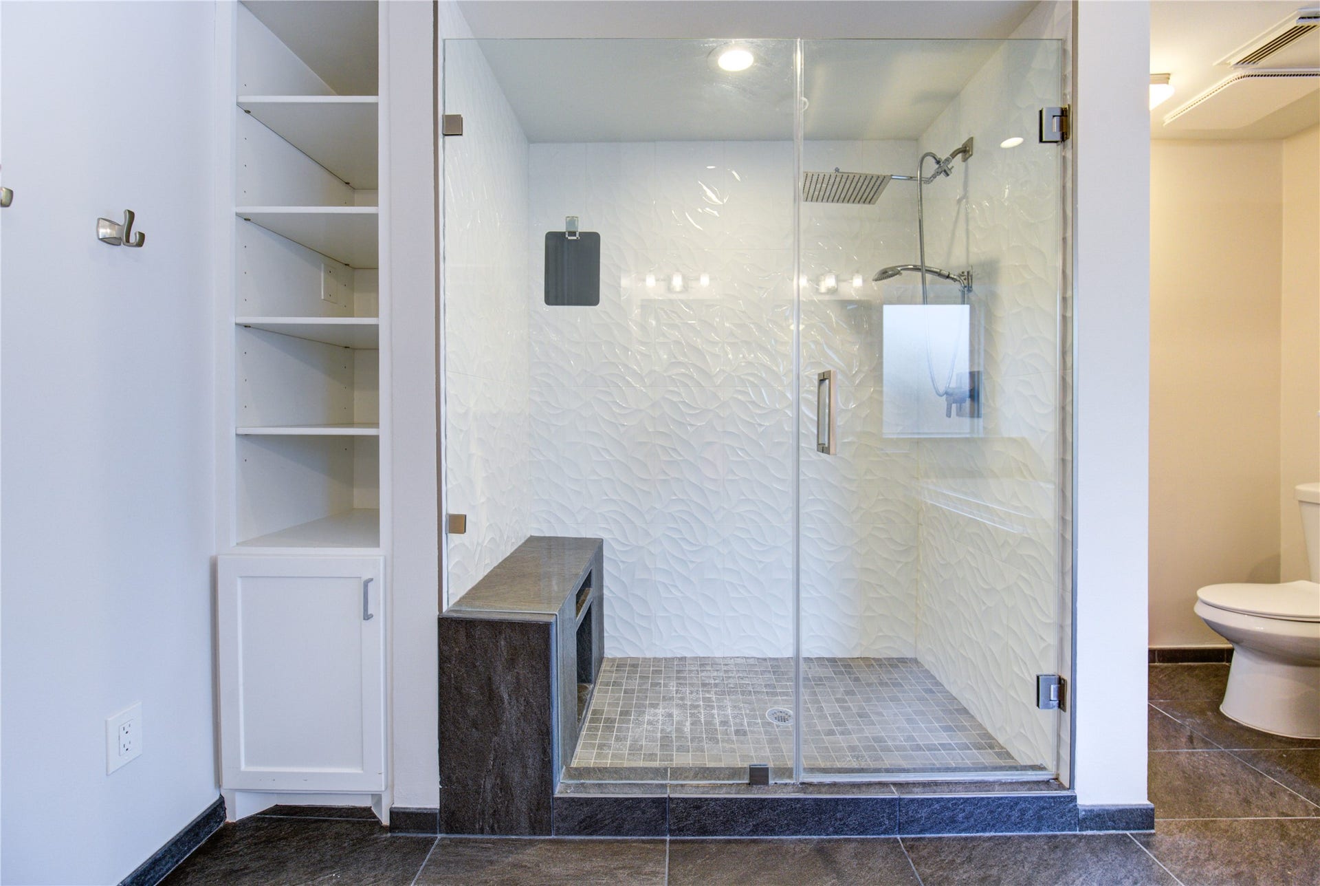 1016 Applewood Drive, Friendswood, TX 77546 Rain shower head and sitting bench