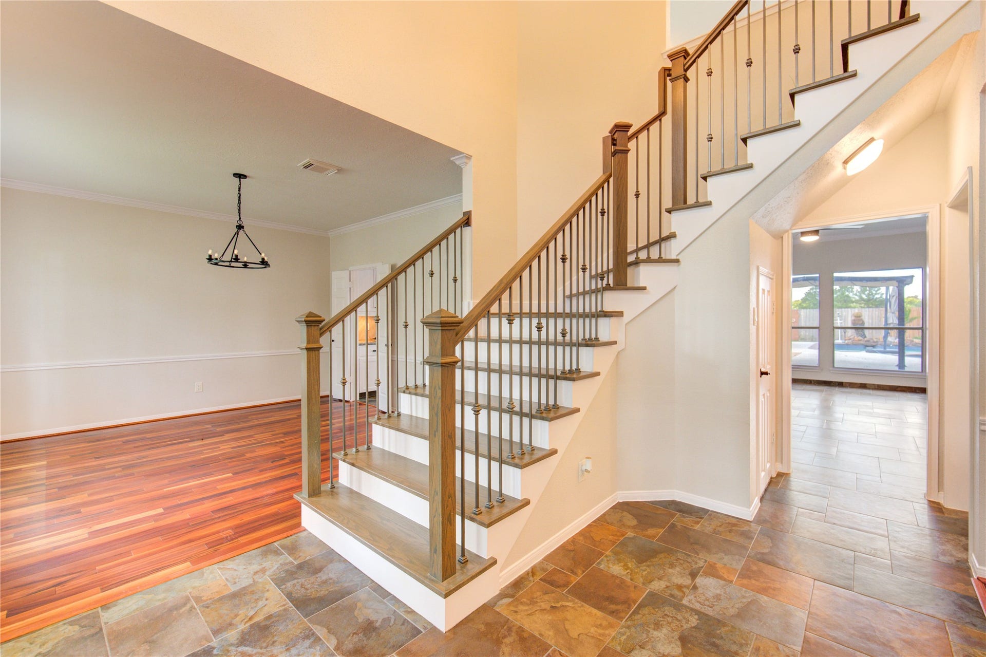 1016 Applewood Drive, Friendswood, TX 77546 Entry to formal-office/study and living area to kitchen and primary along with half bath