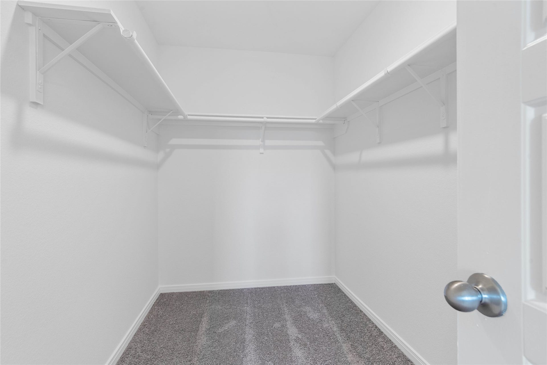 Spacious primary walk in closet.