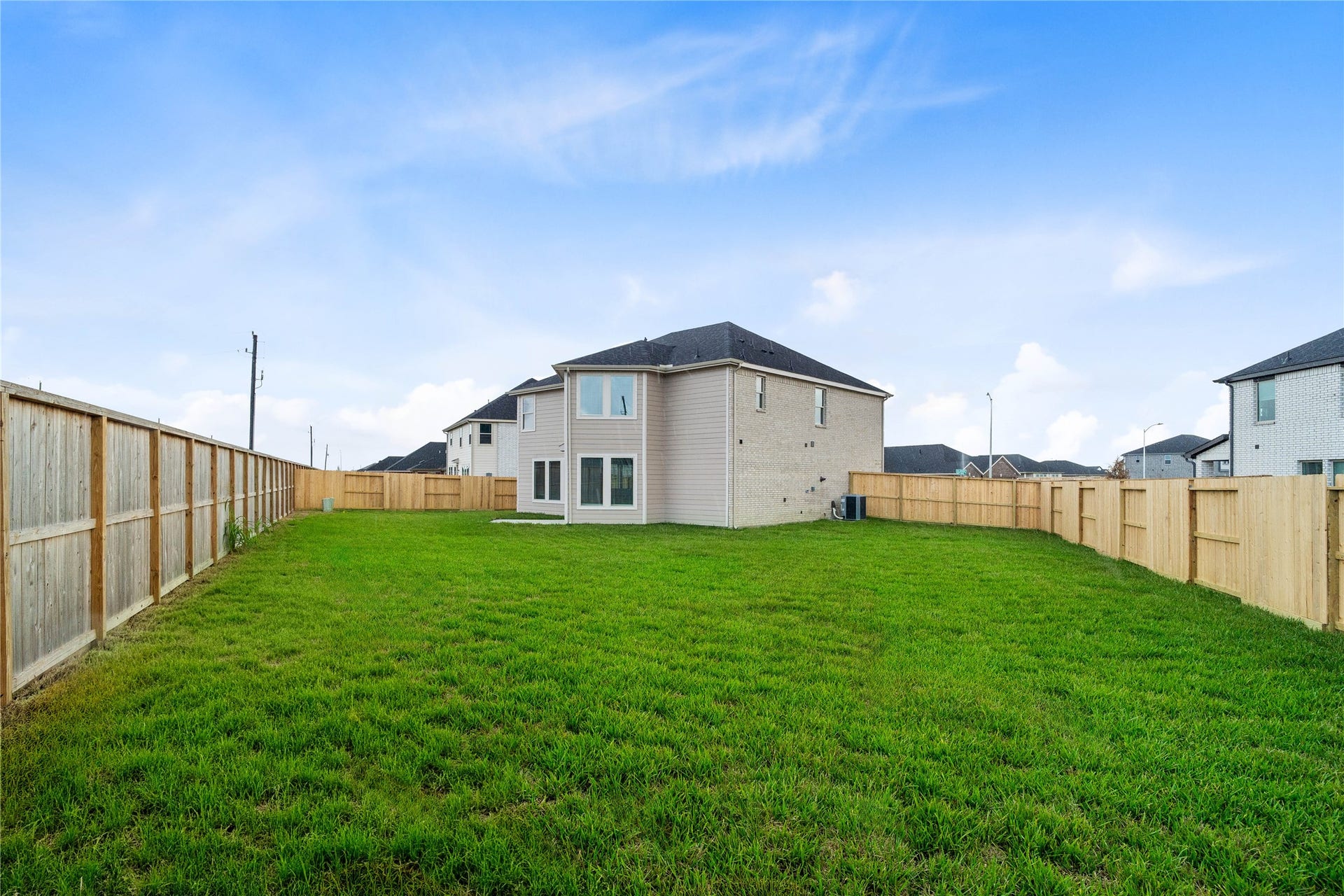 With a fully fenced yard and plenty of green space, this is your chance to create an outdoor retreat that feels like your own.