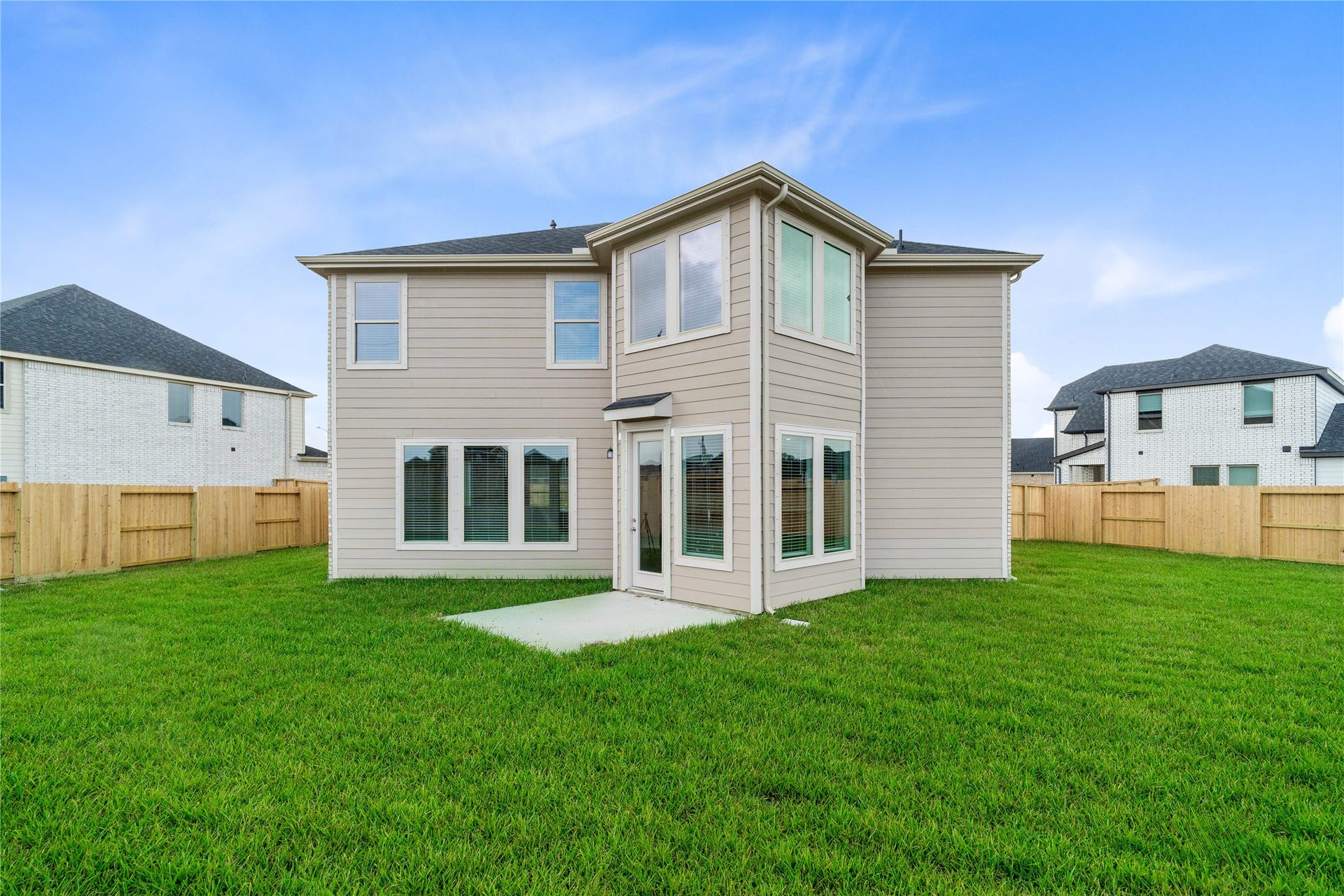Come explore this generous backyard with large patio slabperfect for kids to play freely and adults to unwind in comfort!
