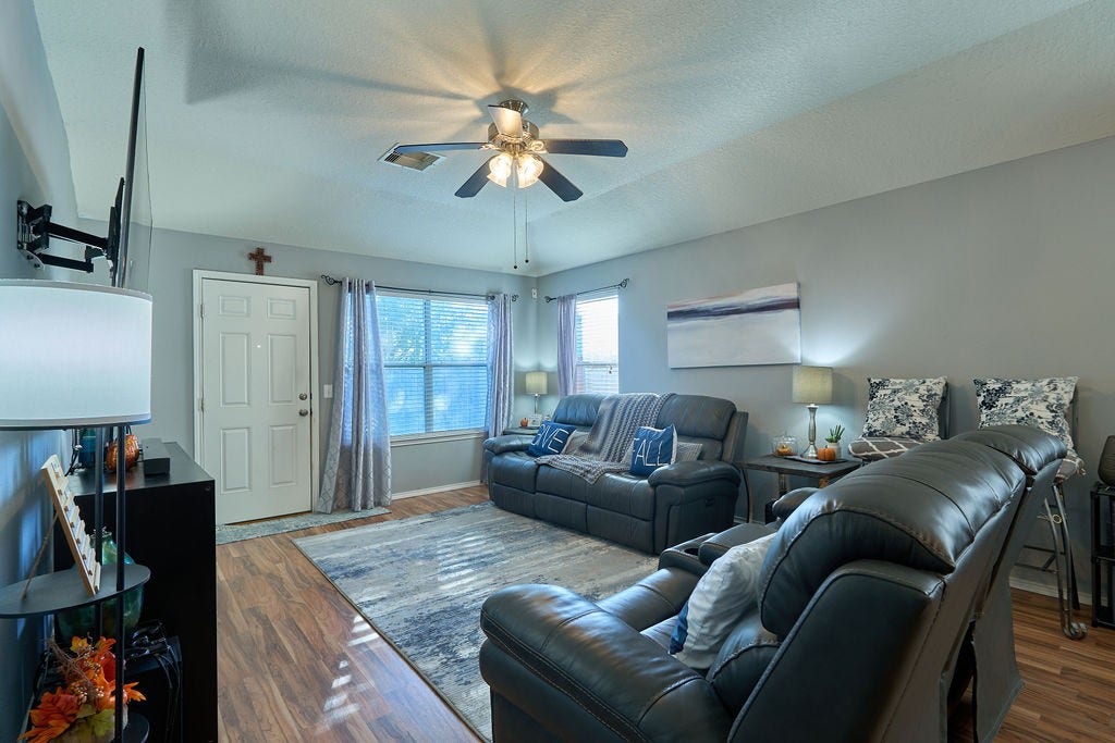 5934 Spring Sunrise Drive, Richmond, TX 77407 Bright, airy, and welcoming! A comfortable living space filled with natural light, perfect for relaxing or entertaining.