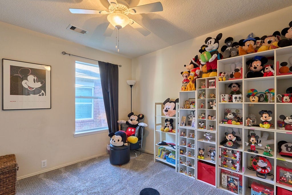 5934 Spring Sunrise Drive, Richmond, TX 77407 A bright and versatile bedroom offering endless possibilities for relaxation, creativity, or personal space.