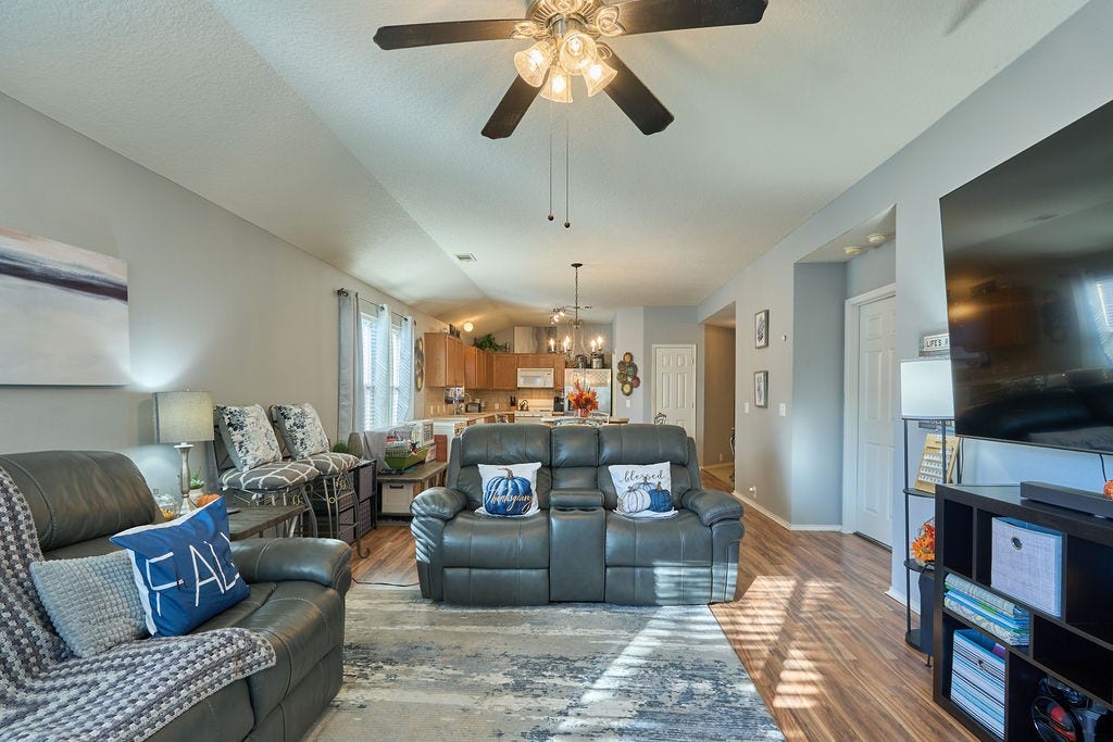 5934 Spring Sunrise Drive, Richmond, TX 77407 Enjoy effortless everyday living in this inviting, open-concept space designed for comfort and connection.