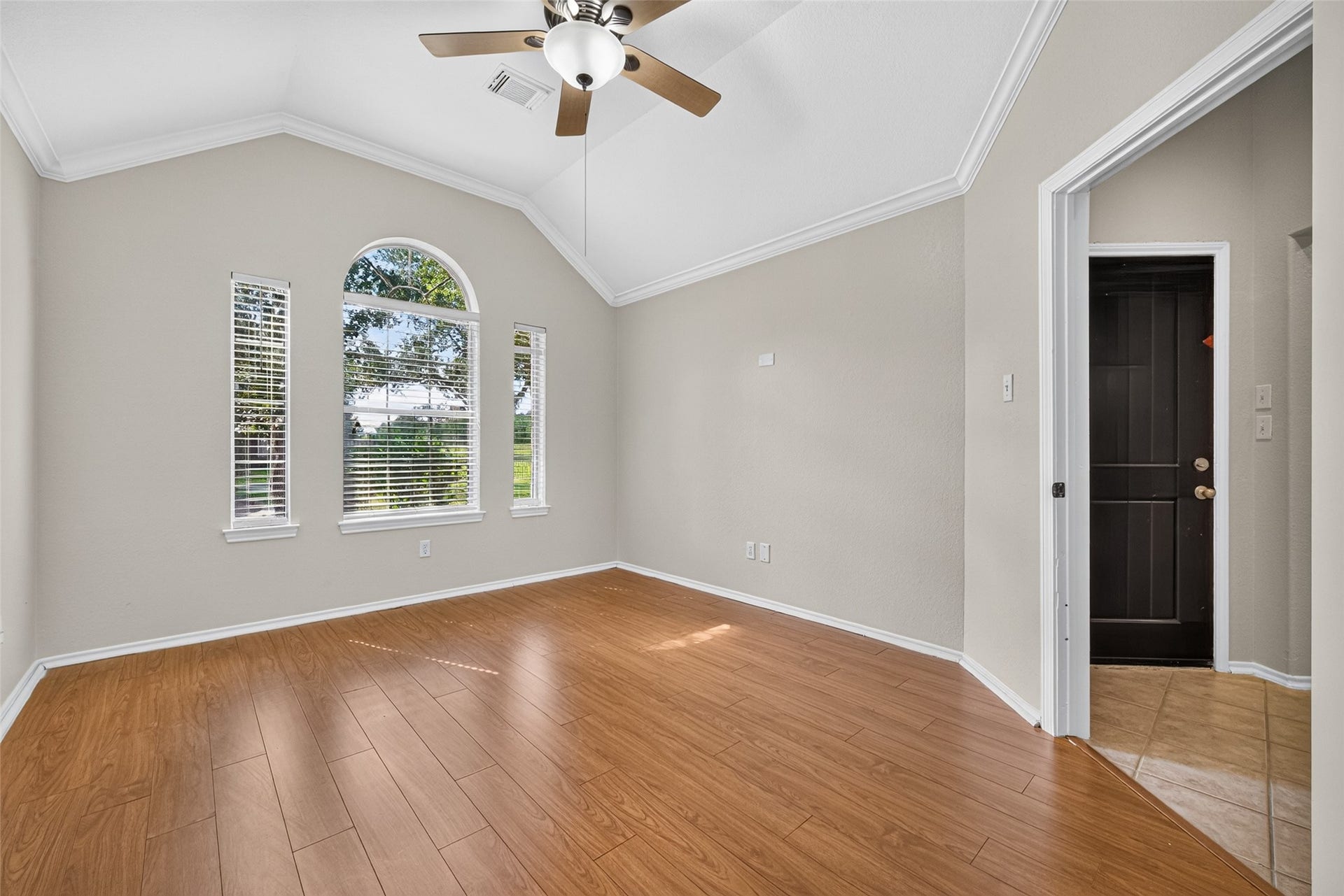 4903 Chappel Hill Drive, Missouri City, TX 77459 Office/study view features a high ceiling and a large window adjacent to the entrance, providing excellent natural light