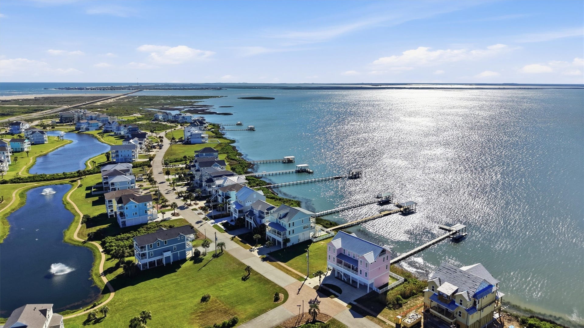 26702 Bay Water Drive, Galveston, TX 77554 This homesite offers an exceptional opportunity to build in a bayside section of Pointe West where water, open space, and coastal beauty surround you.