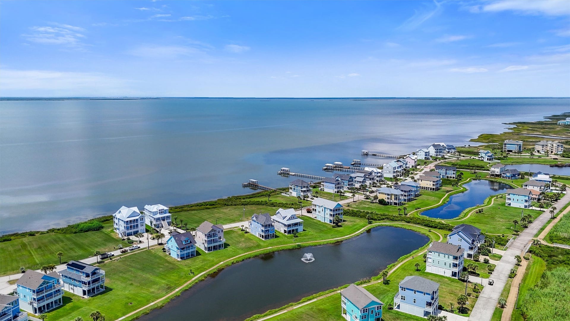 26702 Bay Water Drive, Galveston, TX 77554 Blue bay waters provide the perfect spots for fishing, crabbing, or simply enjoying sunsets.
