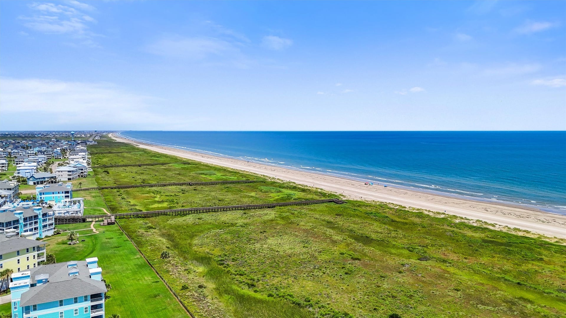 26702 Bay Water Drive, Galveston, TX 77554 Miles of sandy beach are just
steps away, providing endless
opportunities for walks,
sunbathing, and coastal fun.