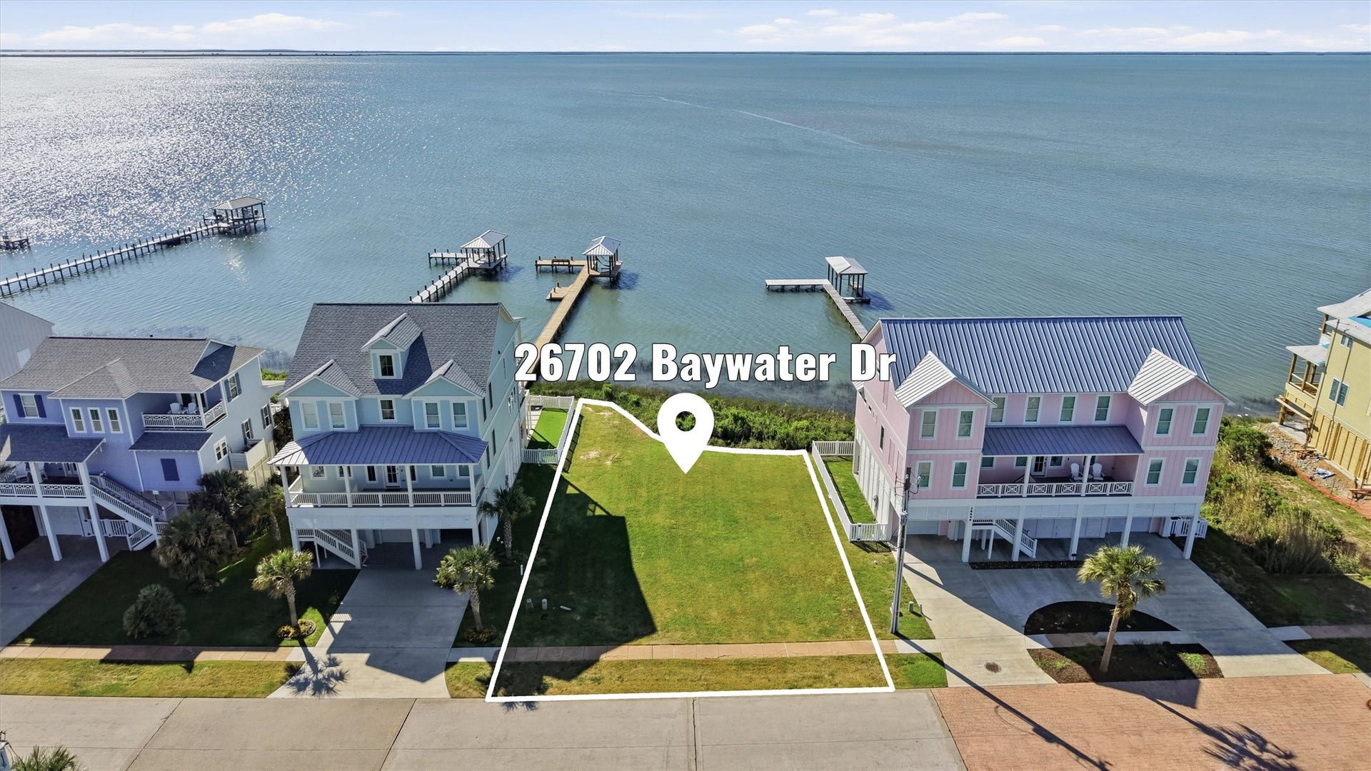 26702 Bay Water Drive, Galveston, TX 77554 Build your coastal getaway in Pointe West on this bayside homesite positioned just one row from West Bay, where water views and unforgettable sunsets are part of everyday life.