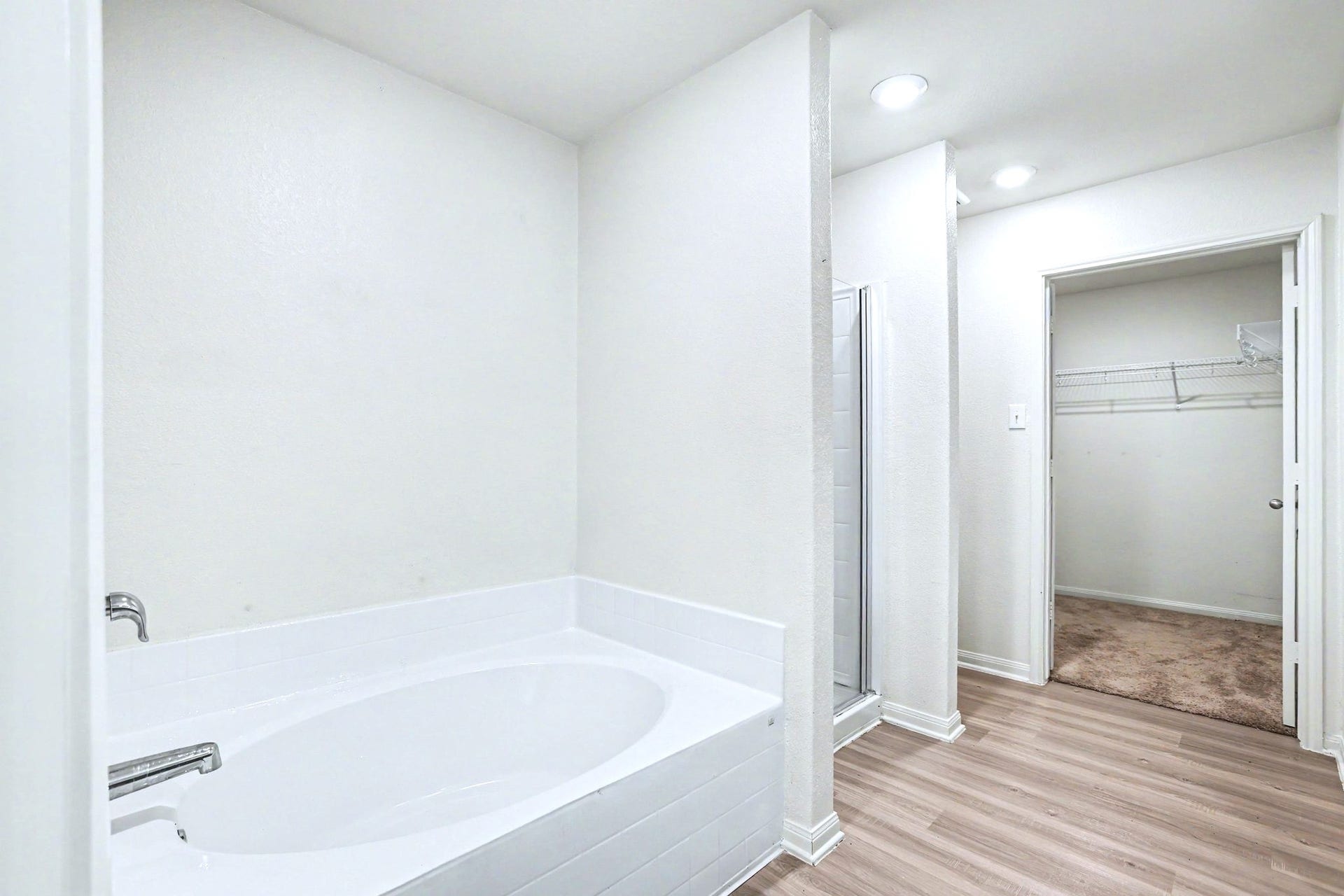 22622 Steel Blue Jaybird Drive, Hockley, TX 77447 Another view of the primary bath including soaking tub, separate shower and large walk-in closet
