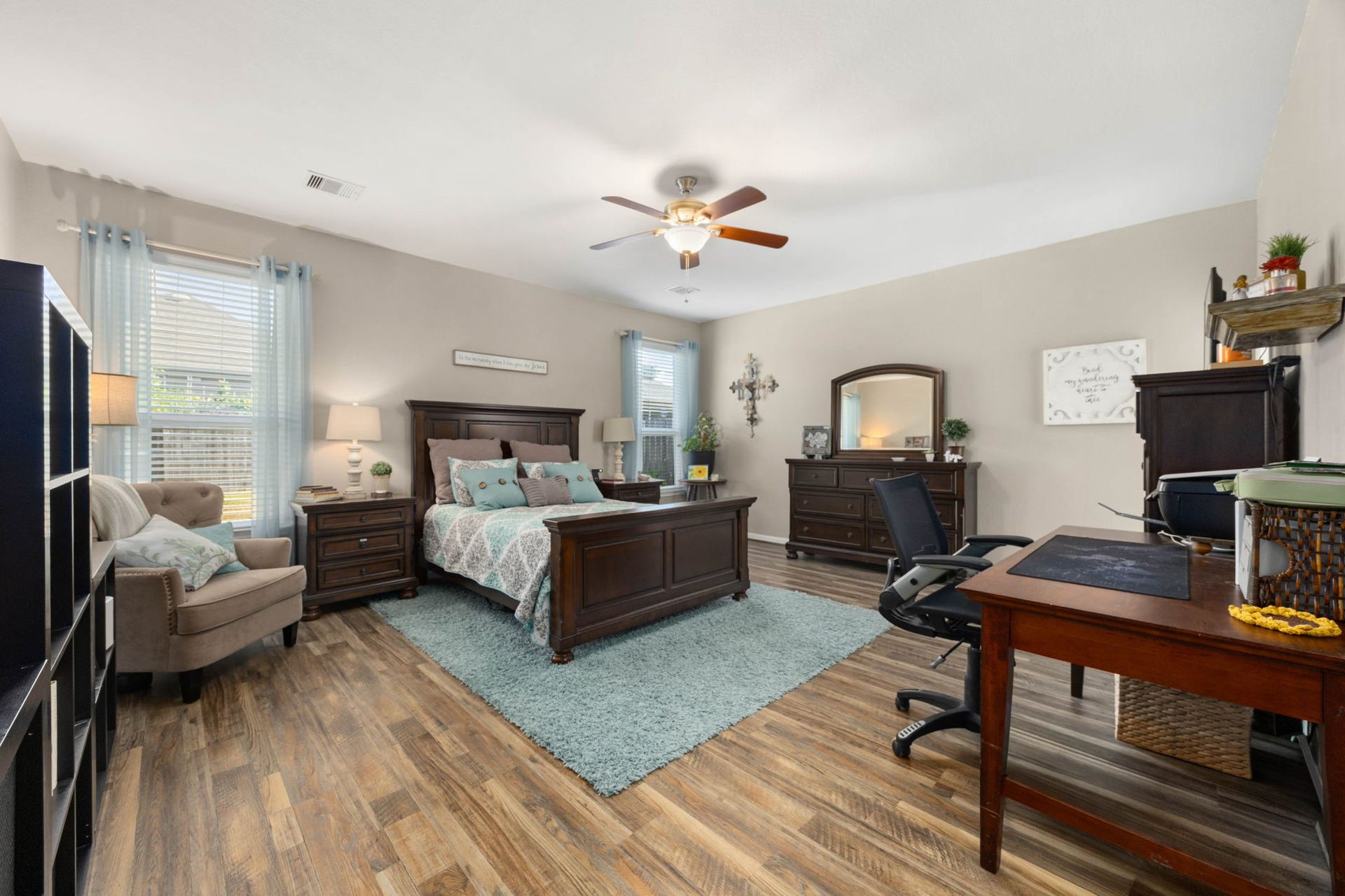 24114 Buffalo Cove Lane, Katy, TX 77493 The large primary bedroom features oversized windows, generous wall space and plenty of room for a full bedroom setup.