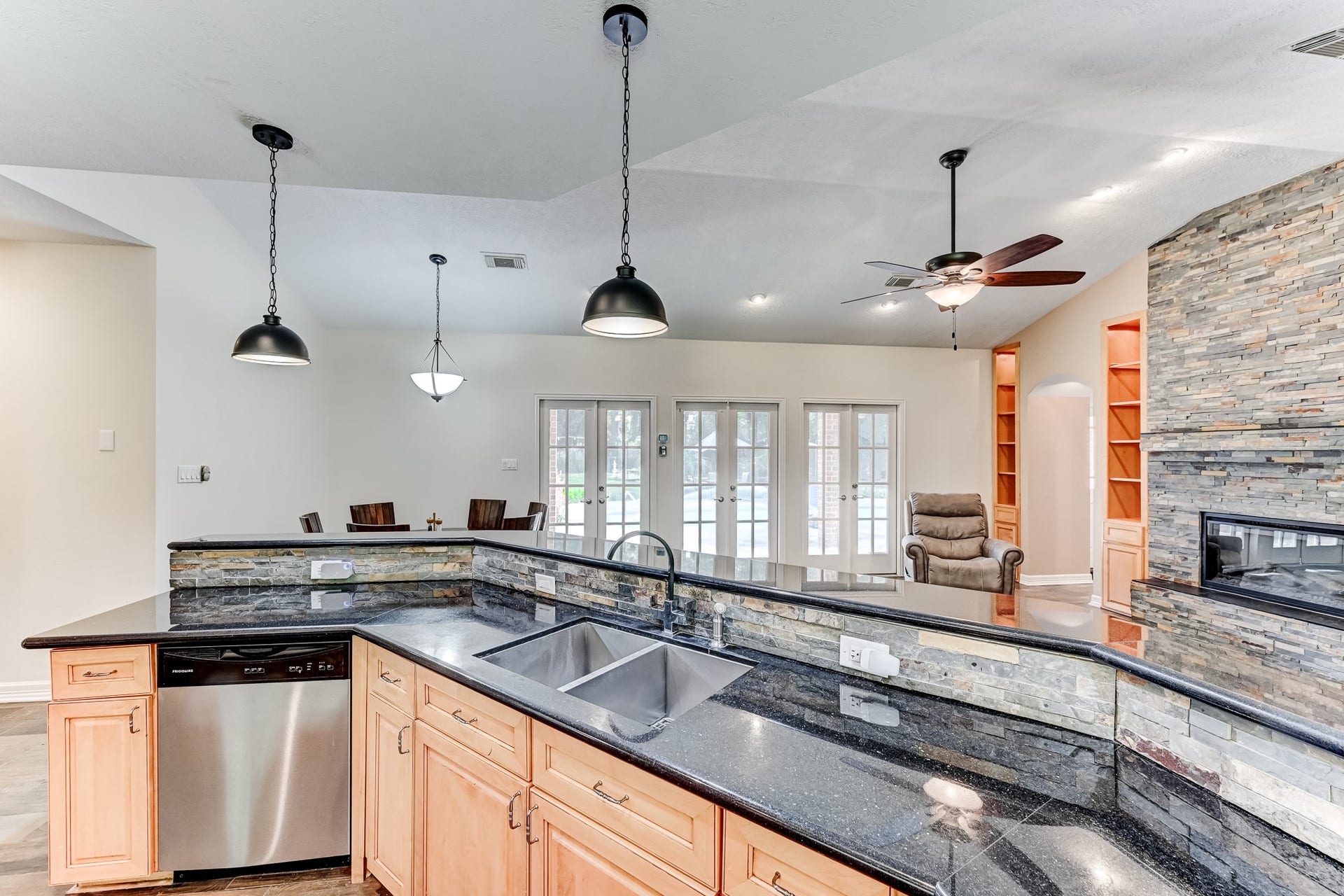 22623 Three Pines Drive, Hockley, TX 77447 Enjoy generous prep space & an open, inviting layout