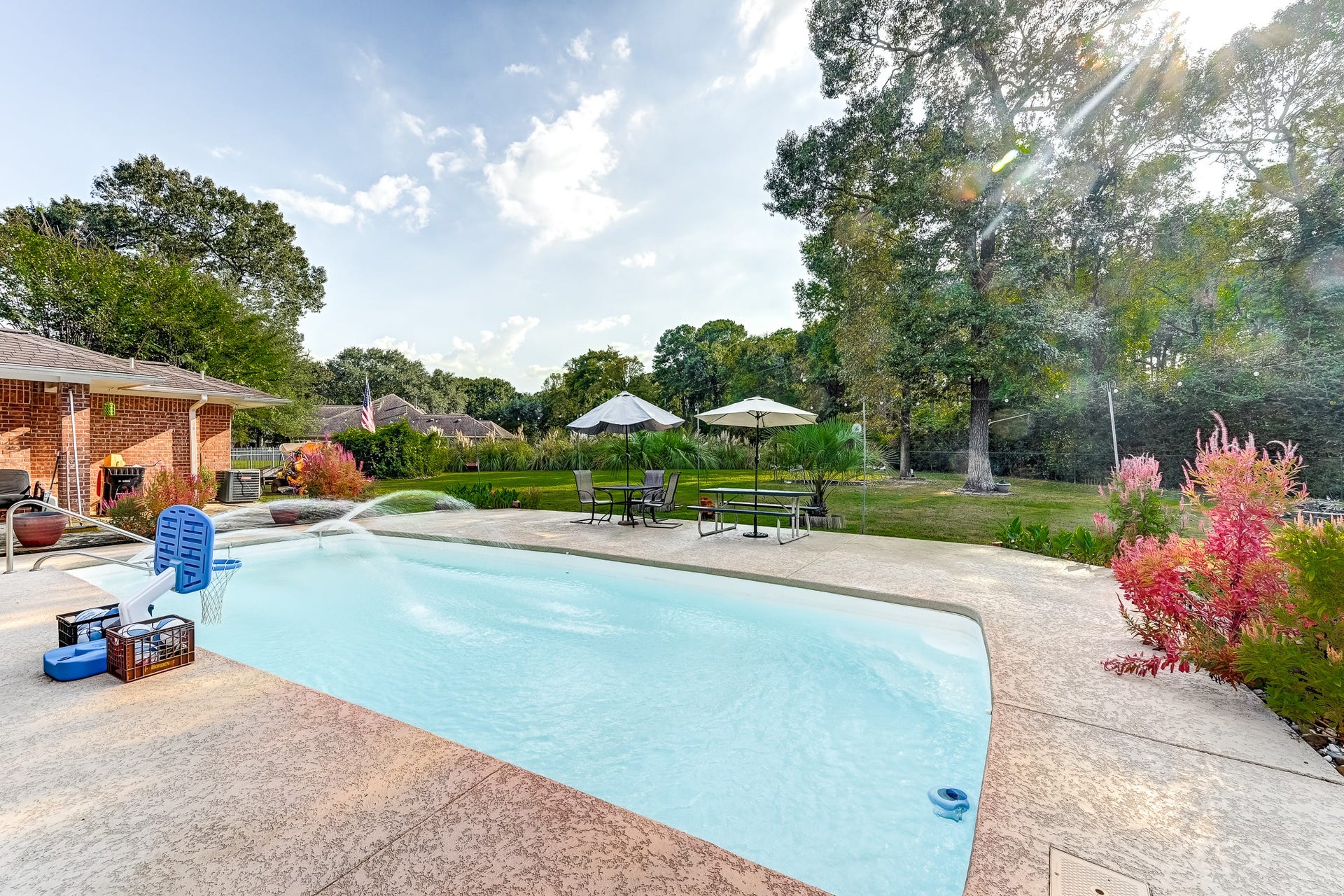 22623 Three Pines Drive, Hockley, TX 77447 Enjoy sunny afternoons & relaxing poolside living