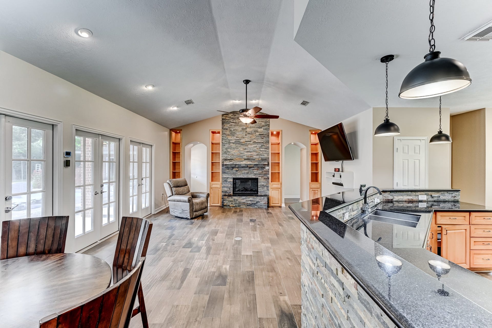 22623 Three Pines Drive, Hockley, TX 77447 Open-concept living connects seamlessly to the kitchen