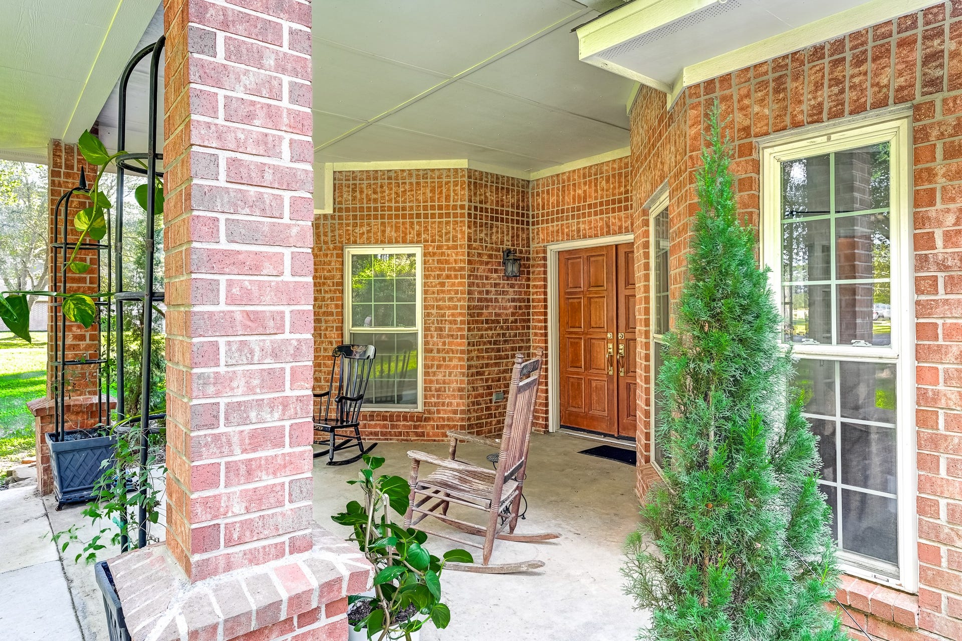 22623 Three Pines Drive, Hockley, TX 77447 Charming covered entry welcomes you home