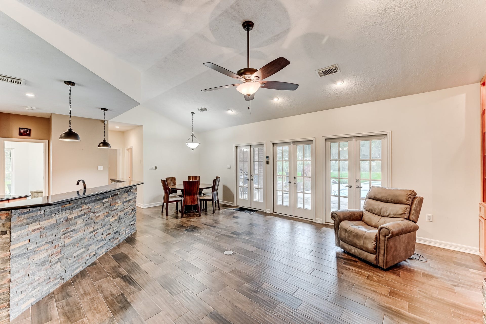 22623 Three Pines Drive, Hockley, TX 77447 Beautiful natural light fills this inviting family room