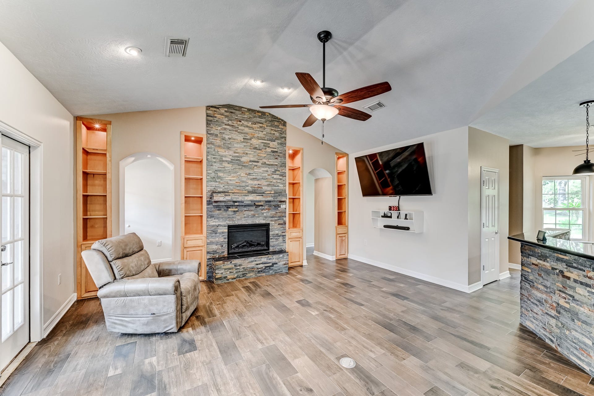 22623 Three Pines Drive, Hockley, TX 77447 Spacious living area with a gorgeous fireplace