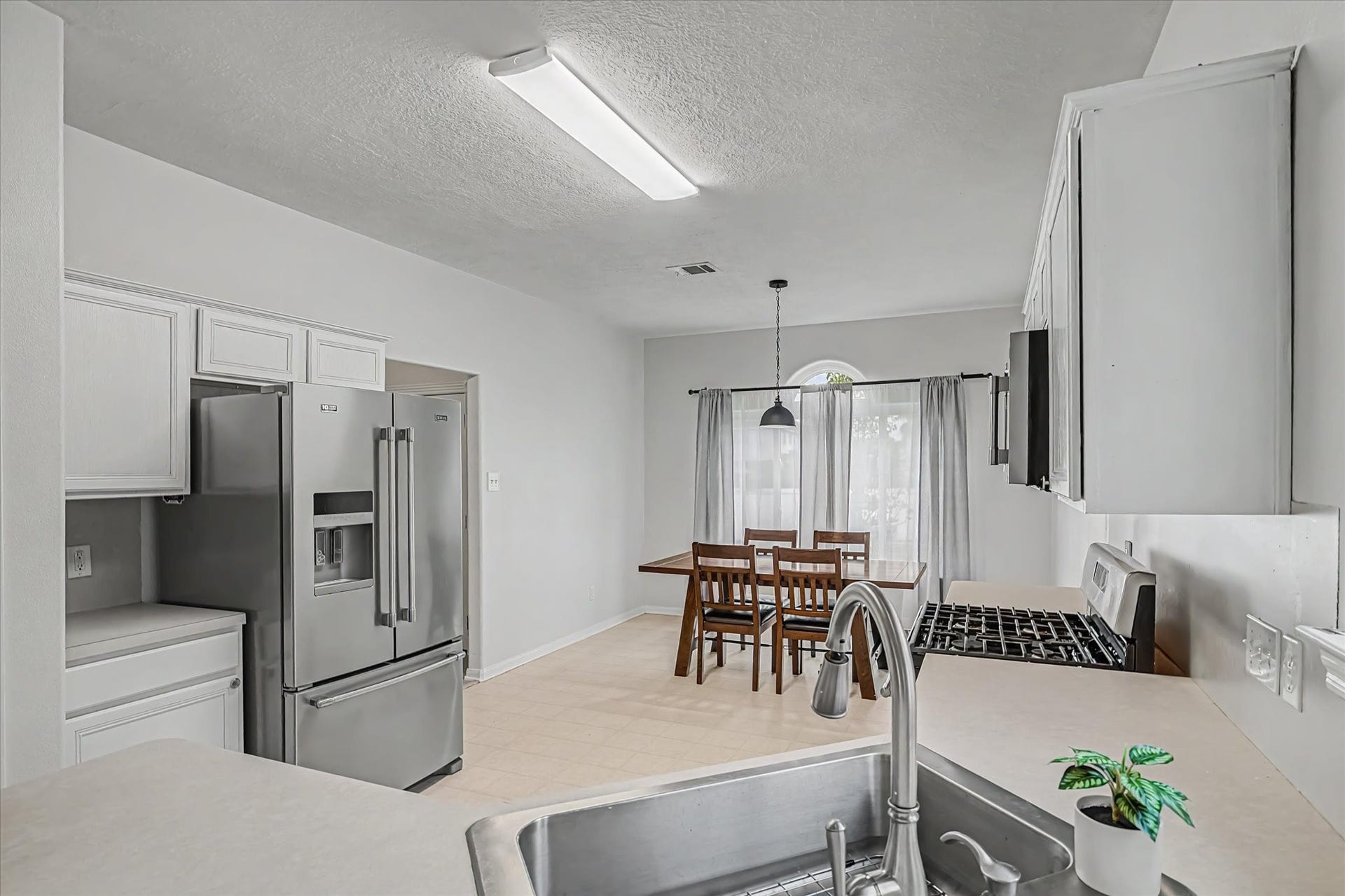 Stainless Steel Fridge Stays w/ Home
