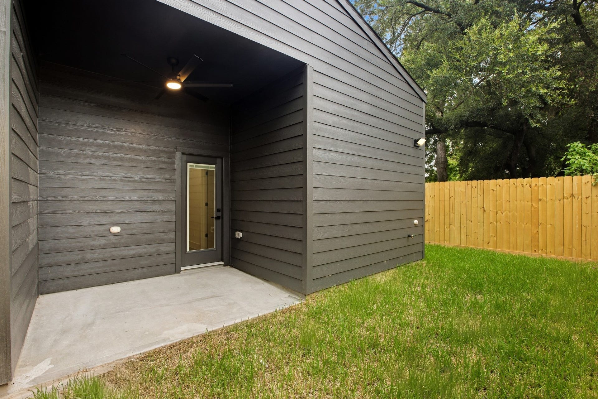 Covered outdoor space creating a stylish extension of the home.