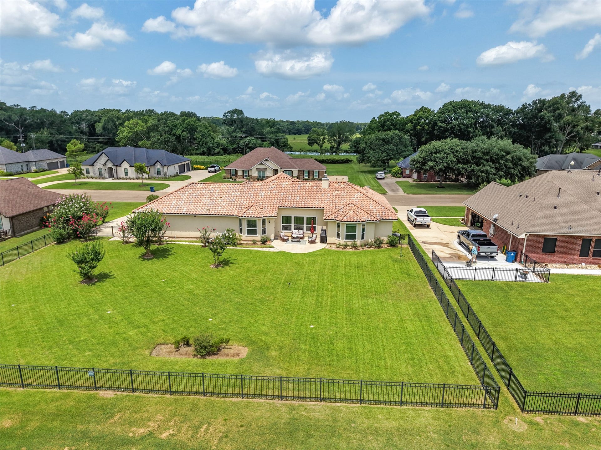 230 Lawrence Marshall Drive, Hempstead, TX 77445 Aerial view showcasing the expansive fenced backyard, generous homesite, and beautifully maintained lawn