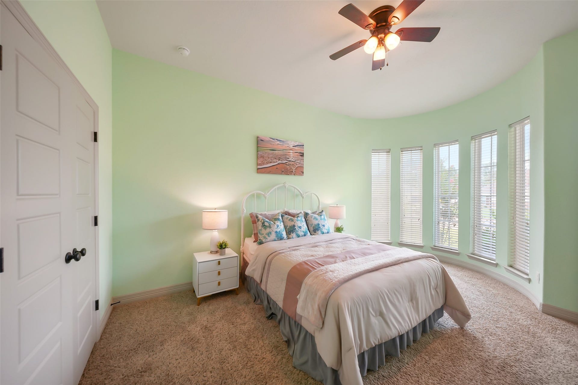 230 Lawrence Marshall Drive, Hempstead, TX 77445 Bright secondary bedroom featuring hardwood floors, oversized windows, and abundant natural light.