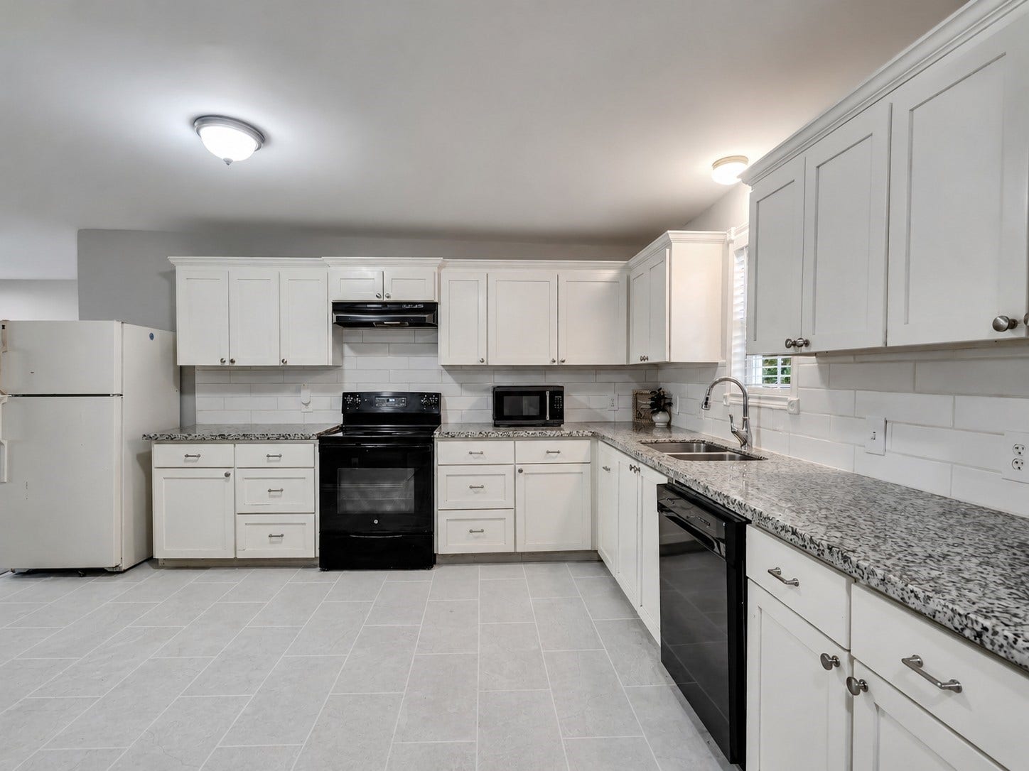 12313 23rd Street, Santa Fe, TX 77510 Kitchen with lots of workspace.
