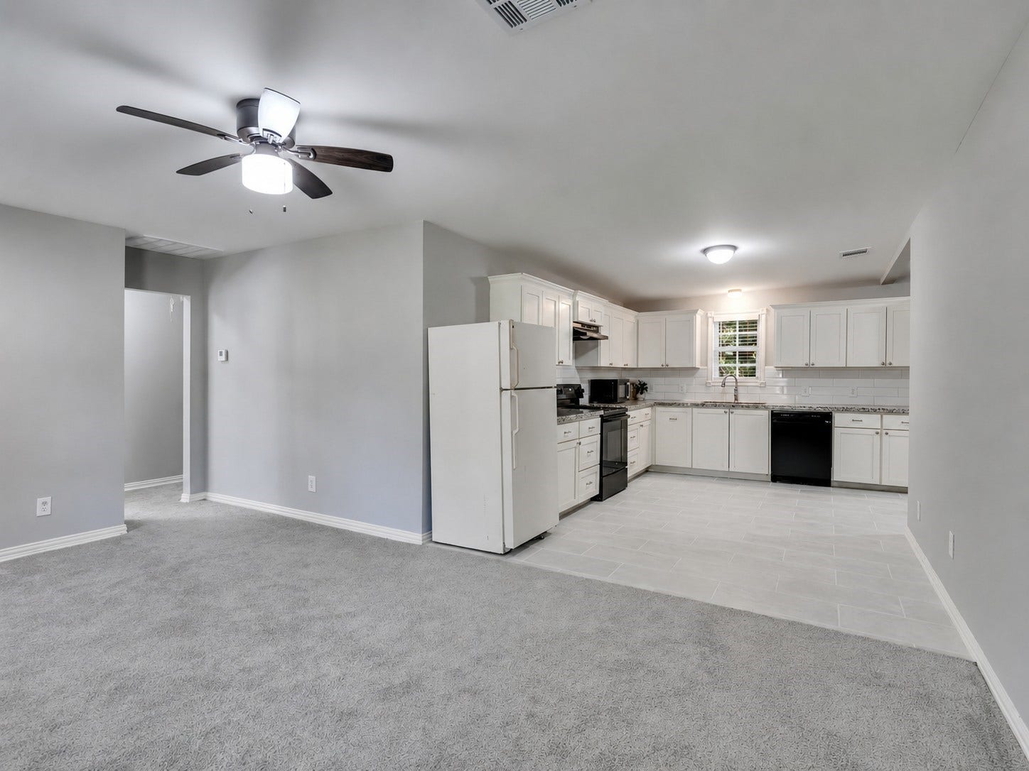 12313 23rd Street, Santa Fe, TX 77510 Kitchen is open to the family room.