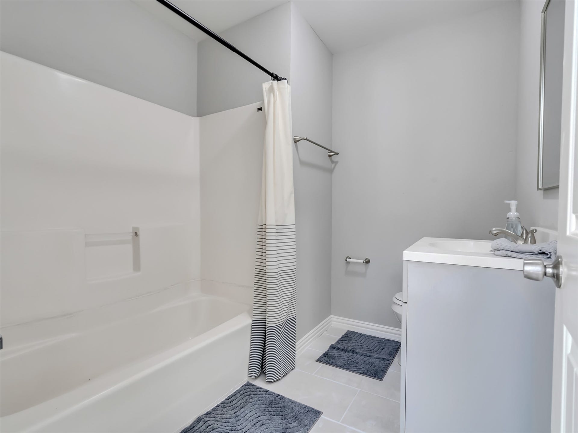 12313 23rd Street, Santa Fe, TX 77510 Updated ensuite bathroom.