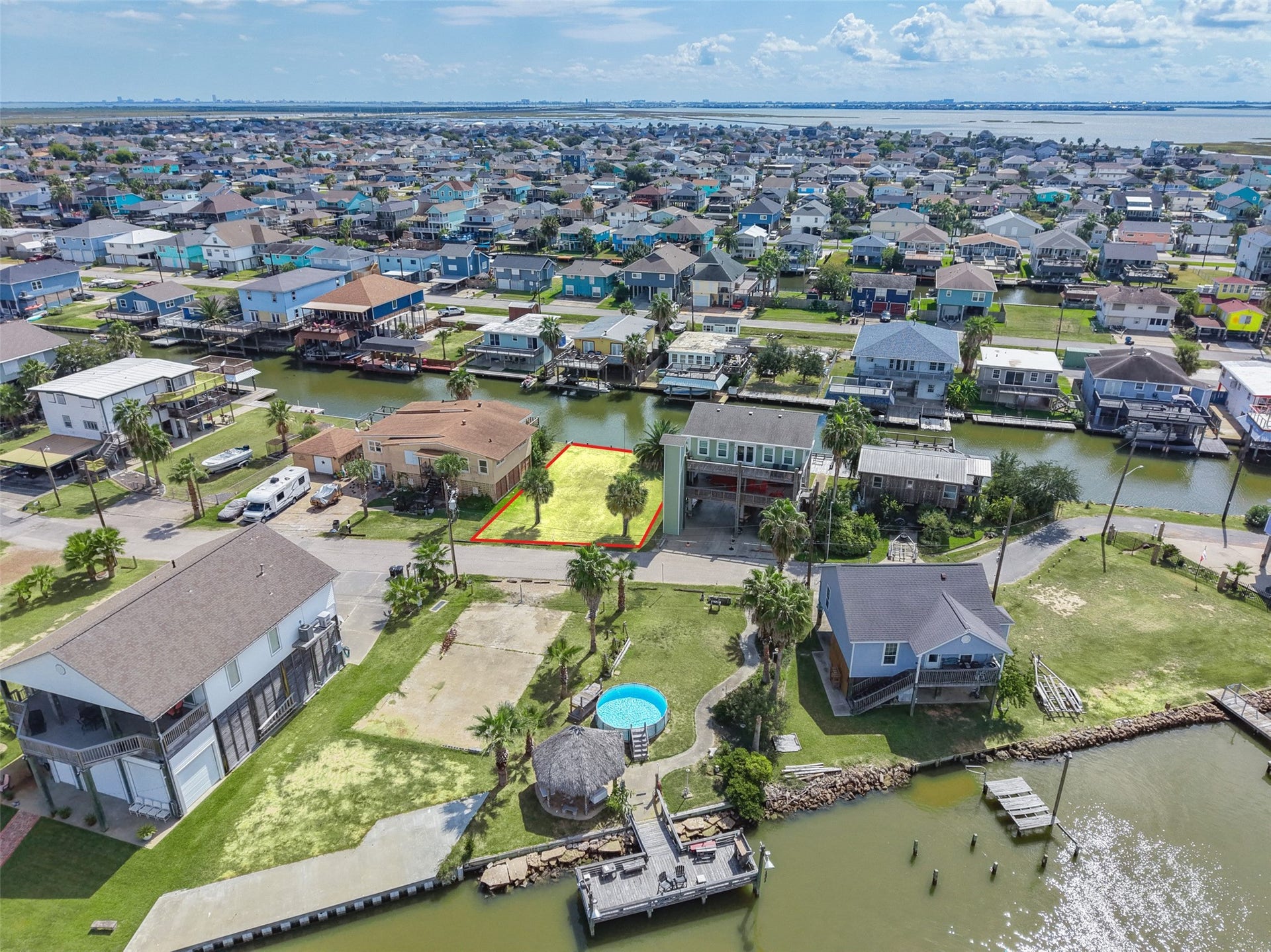 65 Lakeside Drive, Hitchcock, TX 77563 Marsh and open water in the distance are the Galveston Bay system, which is the draw out here. Airbnb rentals are allowed, so a vacation home can double as a rental when you're not using it.