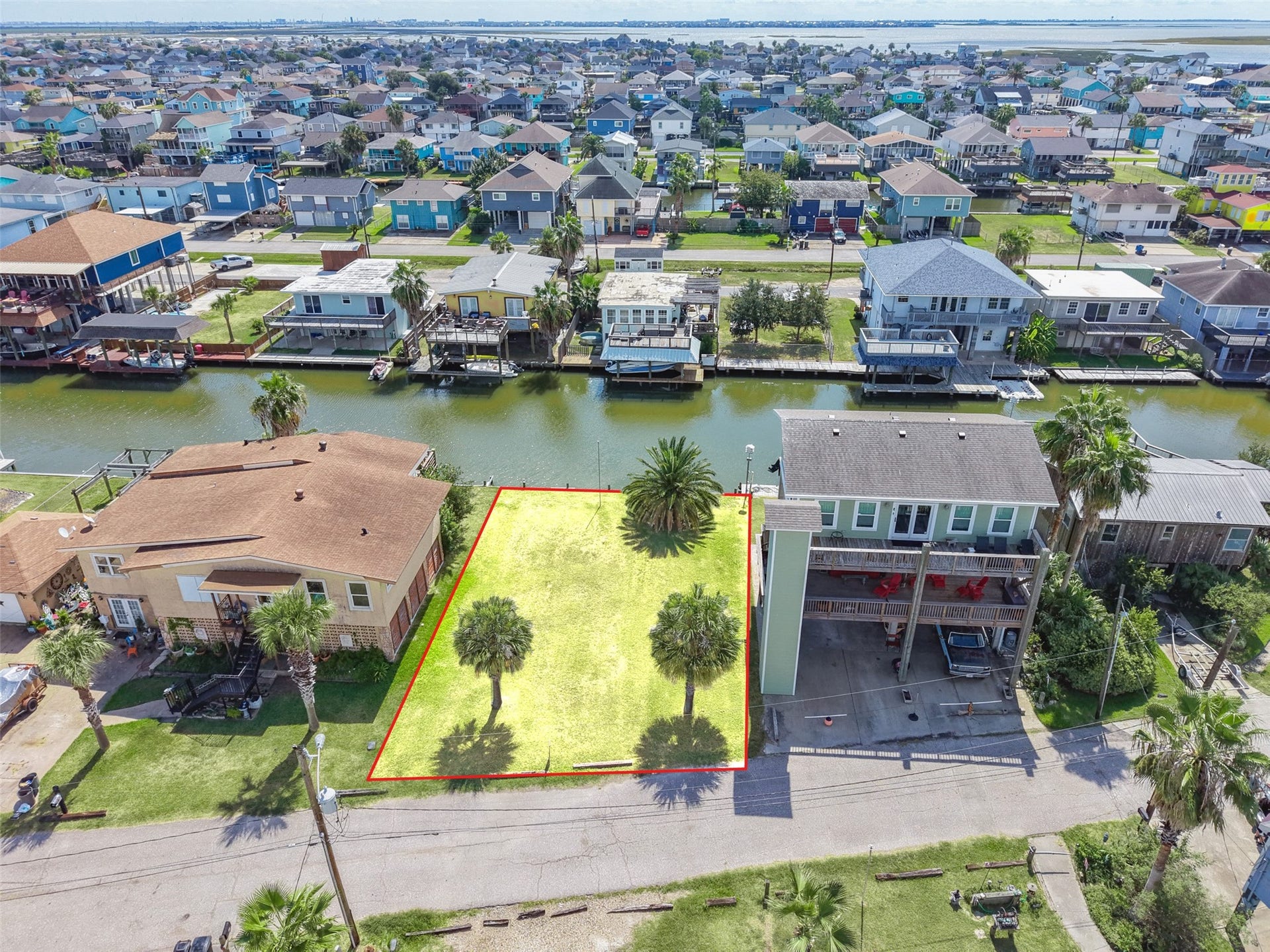 65 Lakeside Drive, Hitchcock, TX 77563 Pulled back over the canals. Bayou Vista was built along dredged canals that reach Galveston Bay and the Gulf, and from up here you can see exactly how the water threads through the neighborhood.
