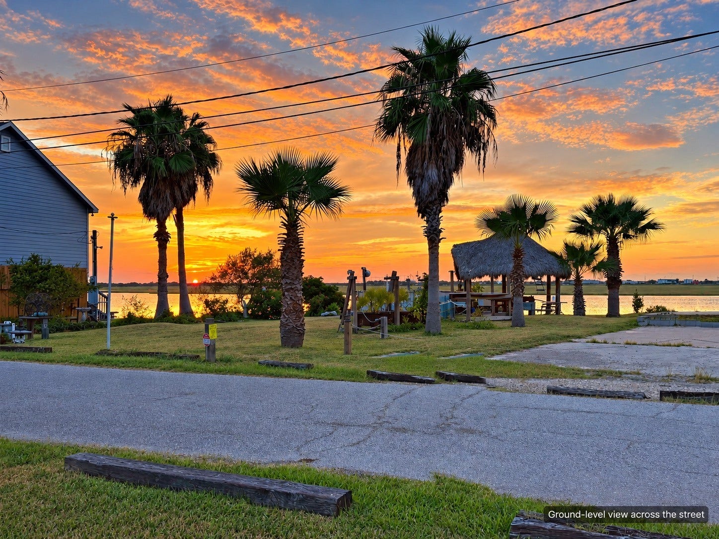 65 Lakeside Drive, Hitchcock, TX 77563 Incredible sunset views across the street! The lots over there are vacant, so the sky stays wide open at the end of the day. Picture this from the deck of your future build.