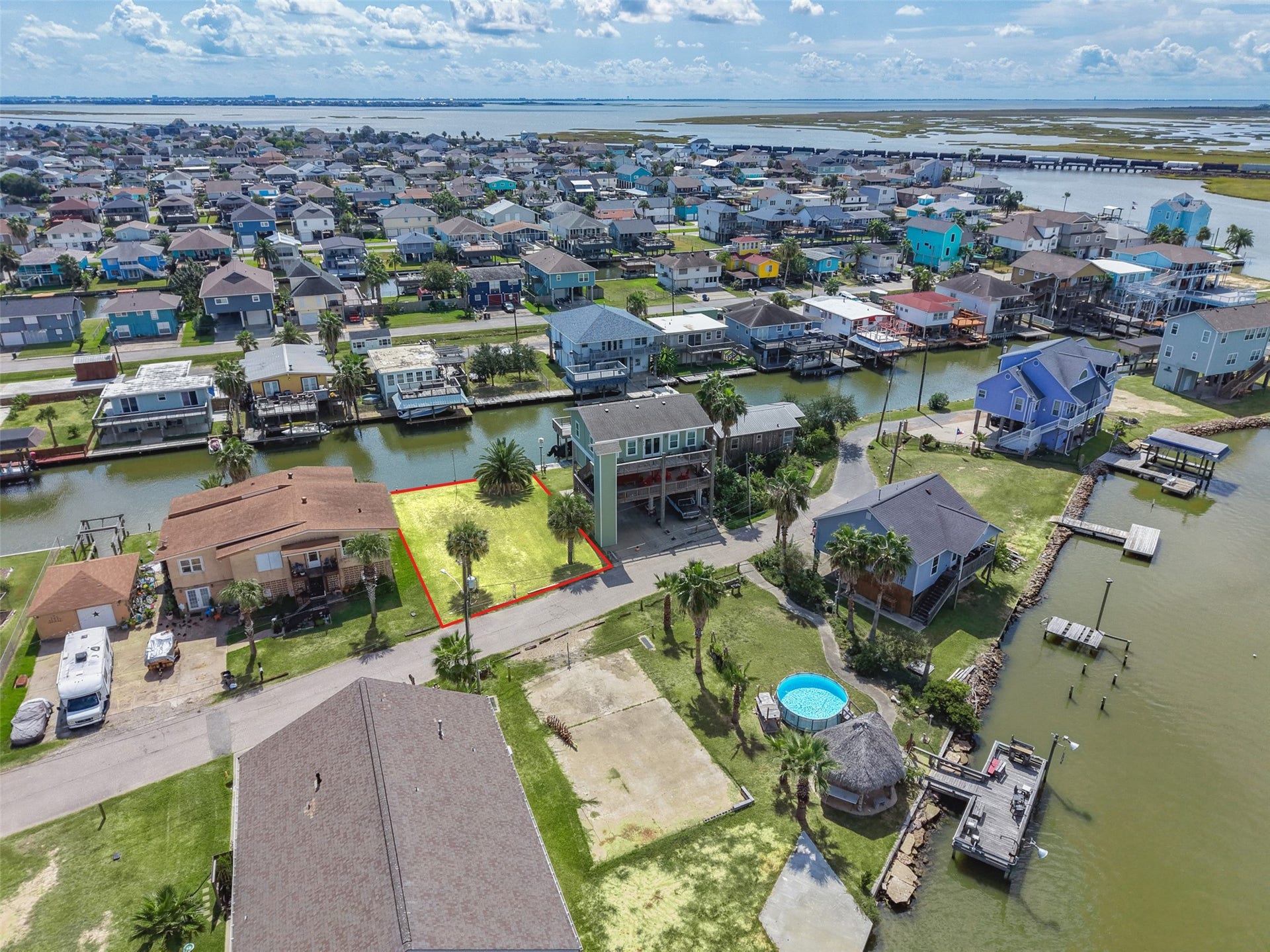 65 Lakeside Drive, Hitchcock, TX 77563 Out across the canals to the open bay beyond. You can see how little stands between the lot and open water! The Texas City Dike is about 6.6 miles away.